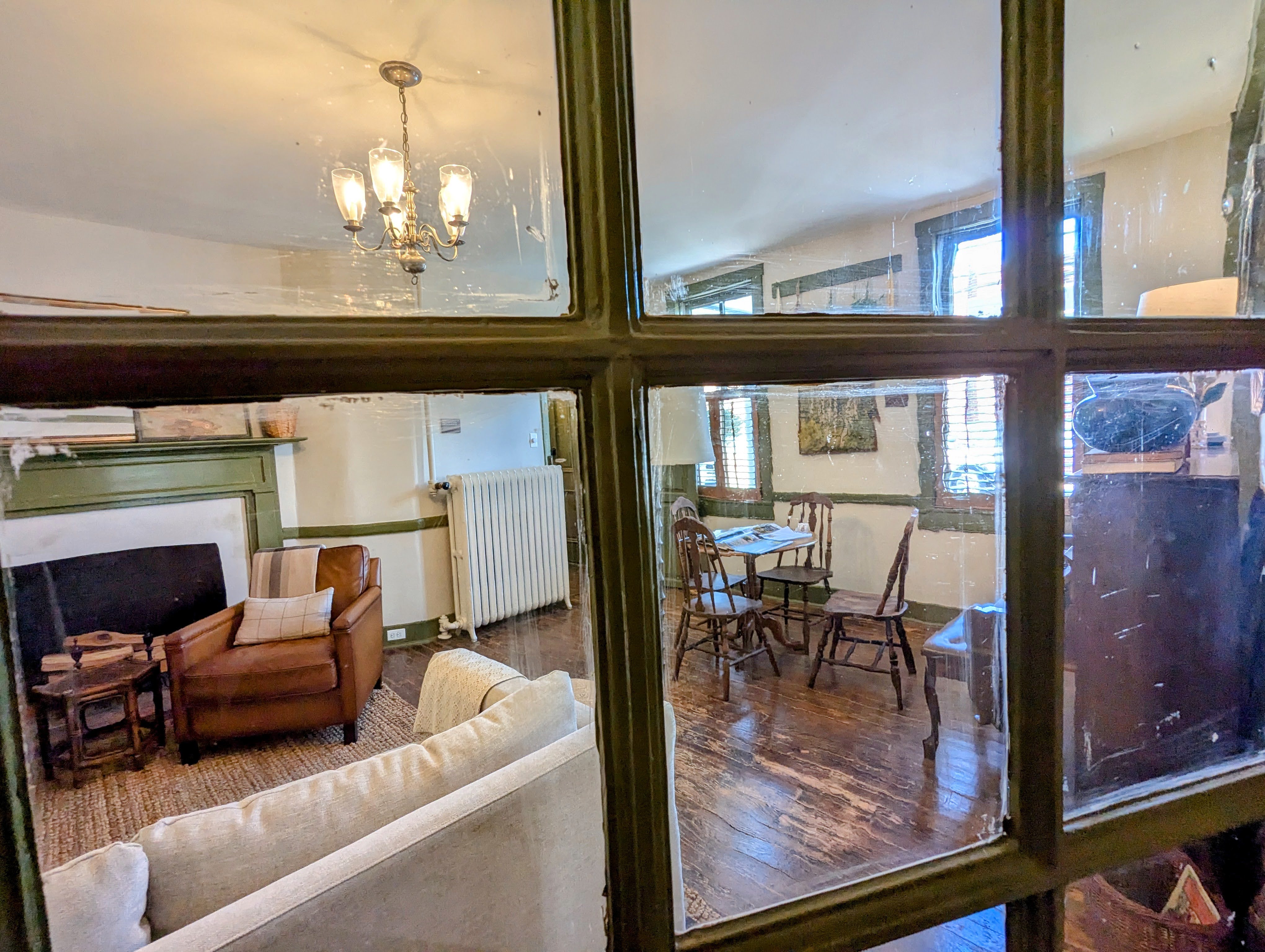 The original house, which may have been started as early as 1681, was expanded in 1908. The expansion added water and additional space. A half-light door with handblown glass panels that once led outside now separates the older and newer sections.