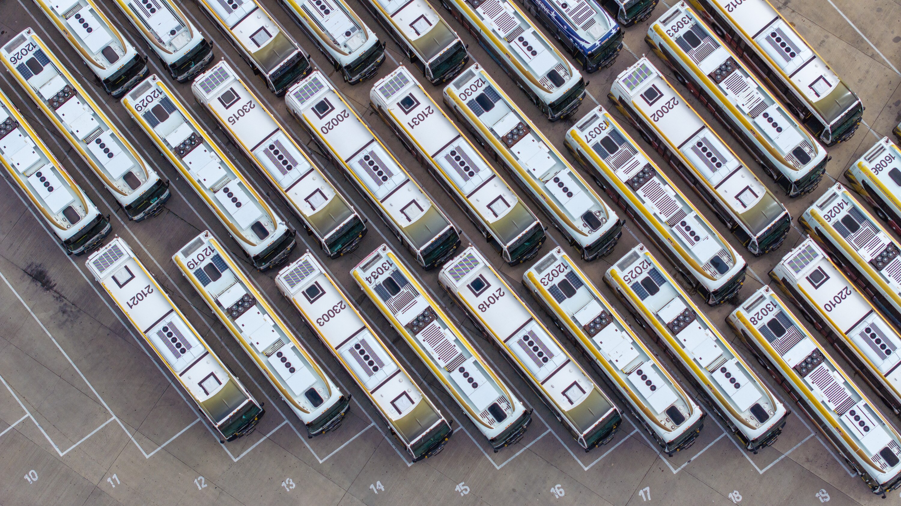 Buses ready to go into service at the MTA’s Eastern Division bus lot in May. A new report shows the MTA needs to spend $2.8 billion to keep its transit systems in a state of good repair.