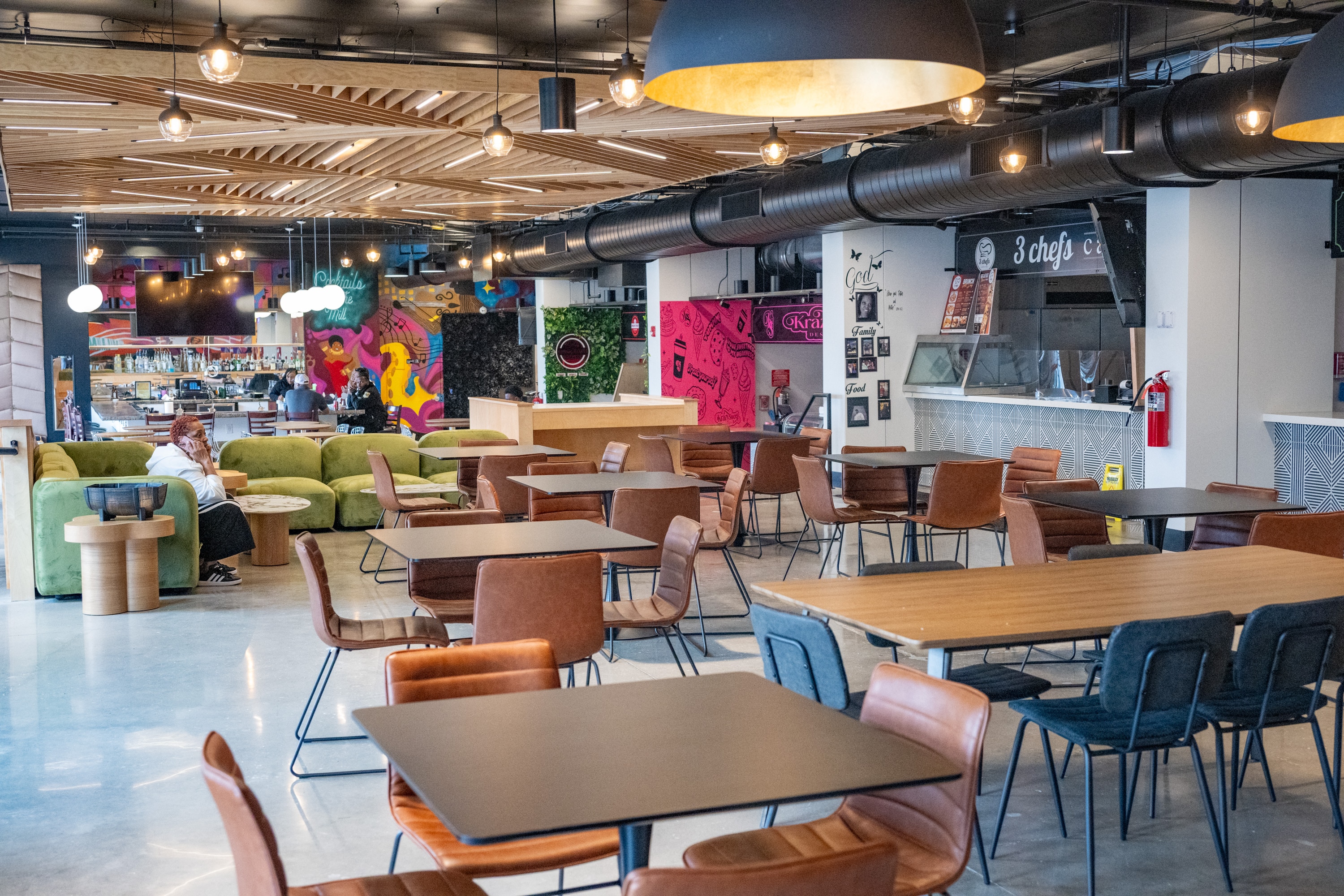 The Mill on North, a new food hall in West Baltimore, features seven food vendors and a cozy atmosphere convenient to Coppin State University.