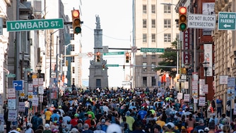 Half Marathon Runners take off up Calvert Street during the Baltimore Running Festival on October 19th, 2024 in Baltimore, MD. Eric Thompson for The Baltimore Banner.