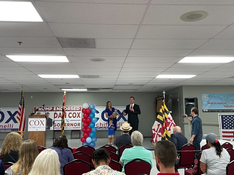 Dan Cox, candidate for the Republican gubernatorial nomination, his wife Valerie Cox and their children address supporters during a primary election night event on July 19, 2022.