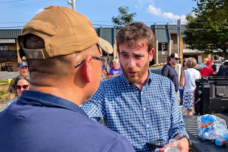 Dan Schwartz, the Democrat running for Congress in Maryland's 1st District, campaigns Aug. 20, 2026 in Bel Air. About 350 people turned out for a rally across the street from his opponent's district office.