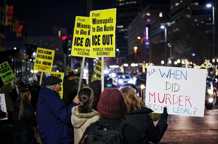People gather at McKeldin Plaza in downtown Baltimore to protest on Thursday after a woman was shot and killed by ICE in Minneapolis the day before.