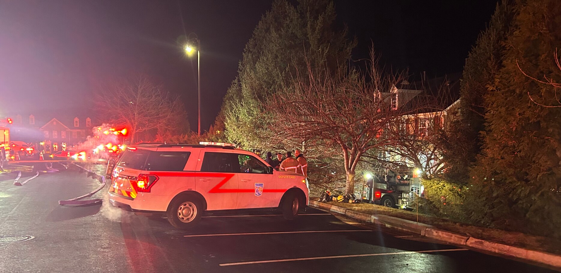 Crews respond to a gas leak after a car crashed into a home in White Marsh.
