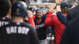 Washington Nationals' CJ Abrams, middle, is congratulated after hitting a home run during the second inning against the Detroit Tigers.