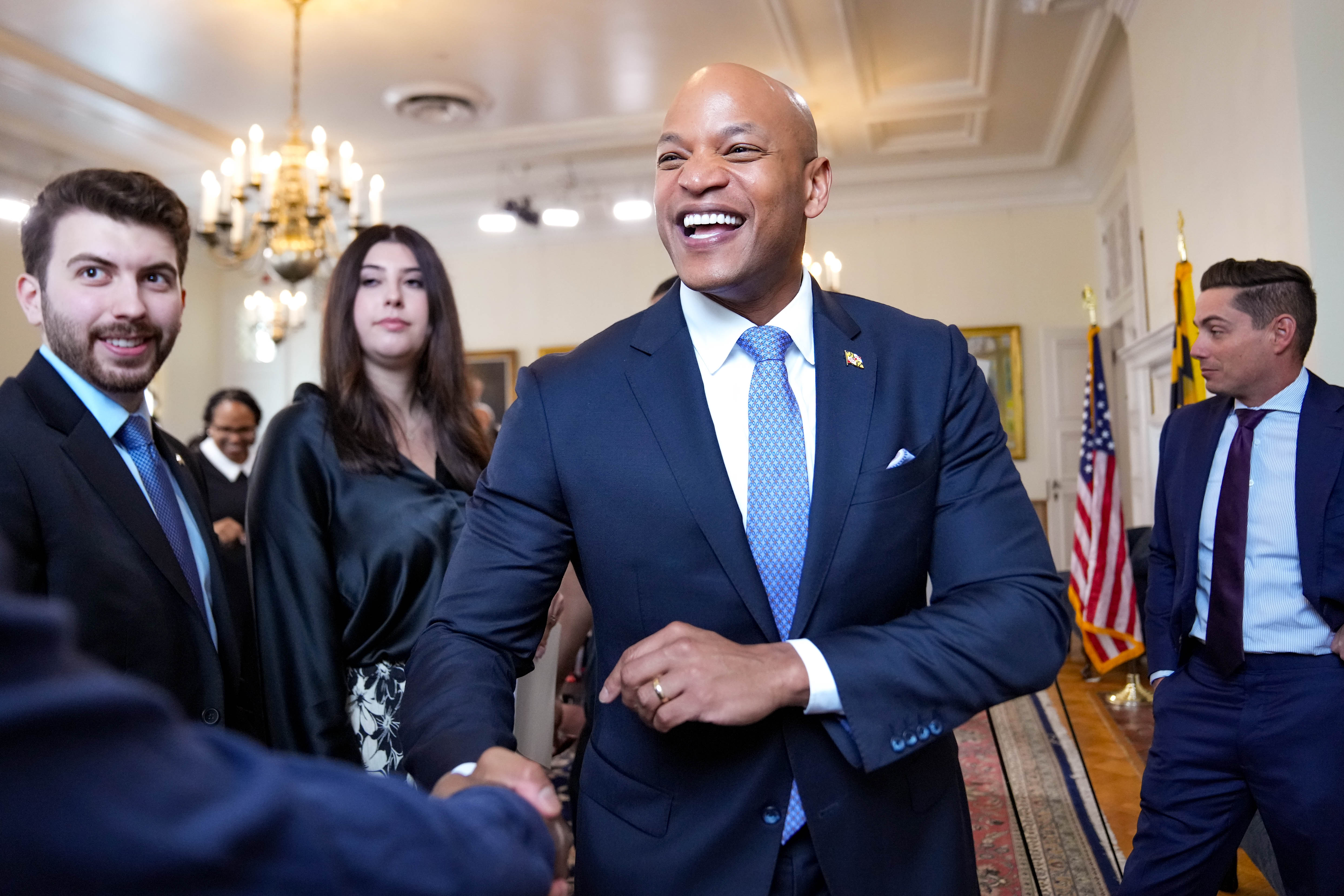 Gov. Wes Moore greets supporters following a press conference at the Maryland State House in Annapolis, Md. on Thursday, May 15, 2025.