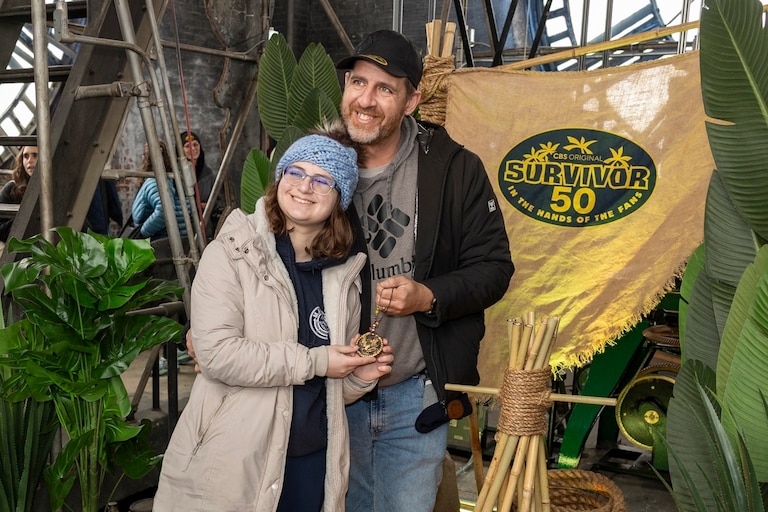 Fans pose with an Immunity Idol at the Bromo Seltzer Arts Tower in Baltimore on Monday during the “Survivor 50 Challenge.”
