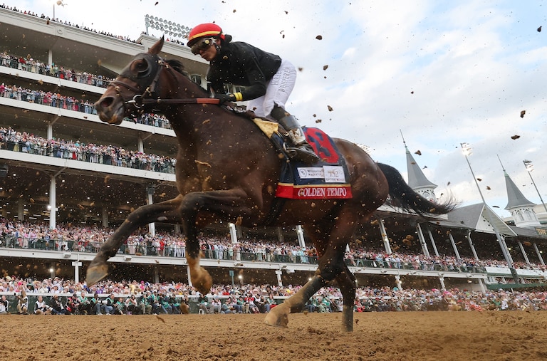 Golden Tempo #19, ridden by jockey Jose Ortiz, heads into the first turn the 152nd running of the Kentucky Derby at Churchill Downs on May 02, 2026 in Louisville, Kentucky.