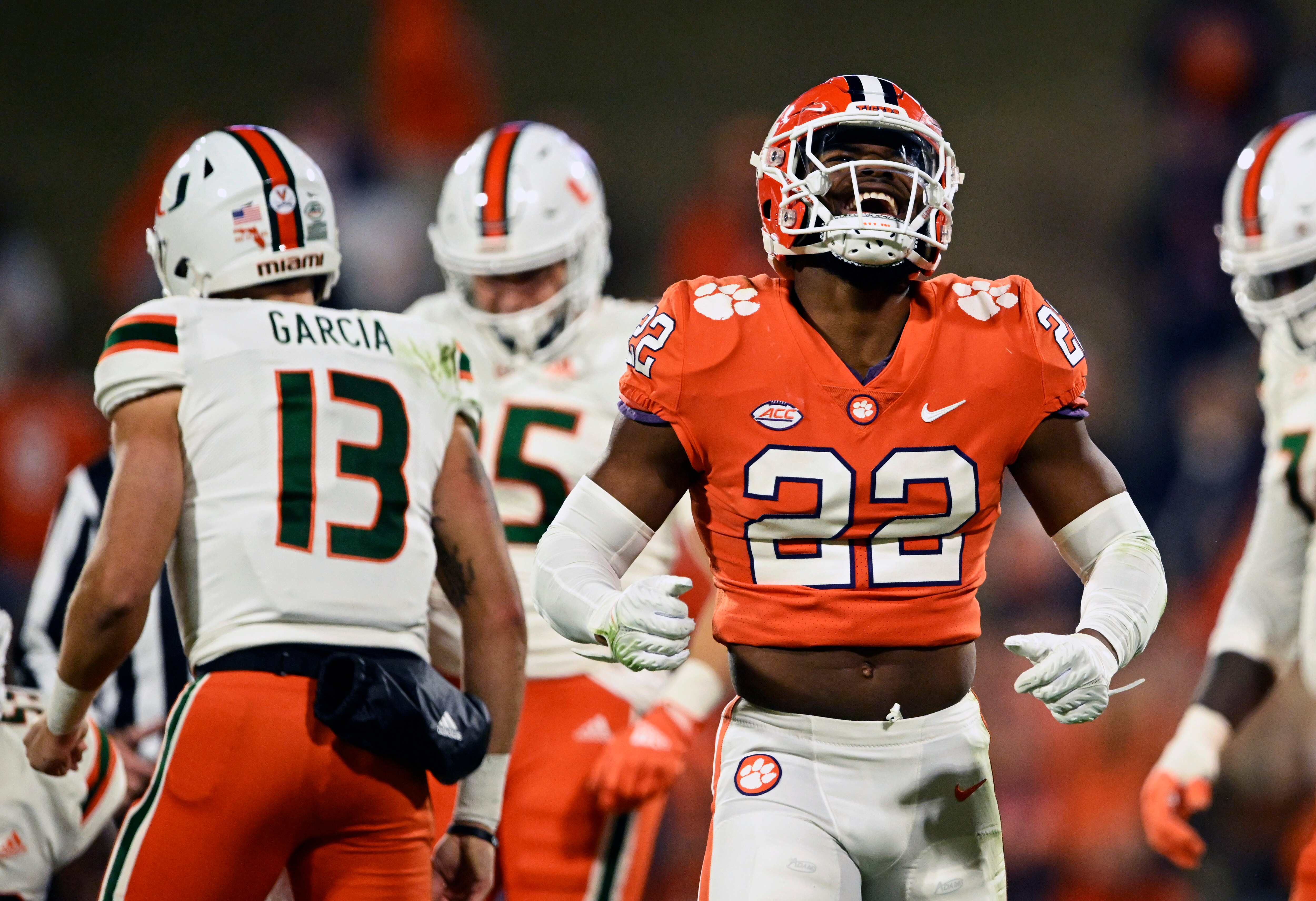 Trenton Simpson #22 of the Clemson Tigers celebrates a fourth quarter sack against the Miami Hurricanes at Memorial Stadium on November 19, 2022 in Clemson, South Carolina.