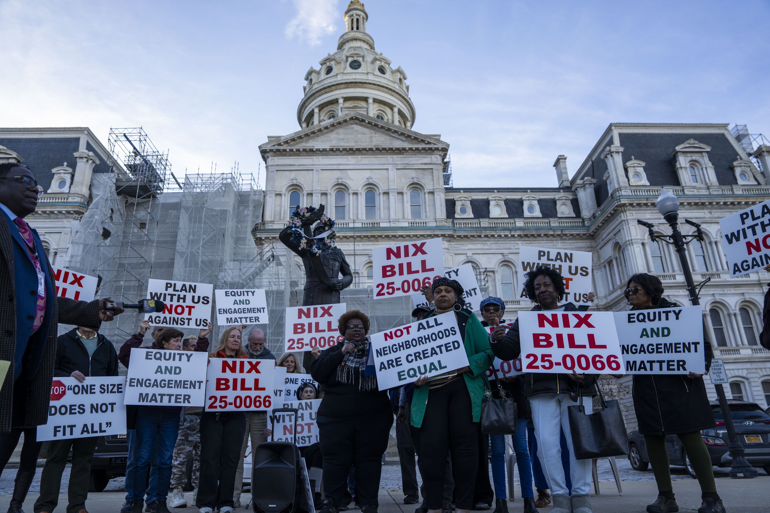 People gathered outside City Hall in November to speak against the Scott administration's package of zoning policy bills. 