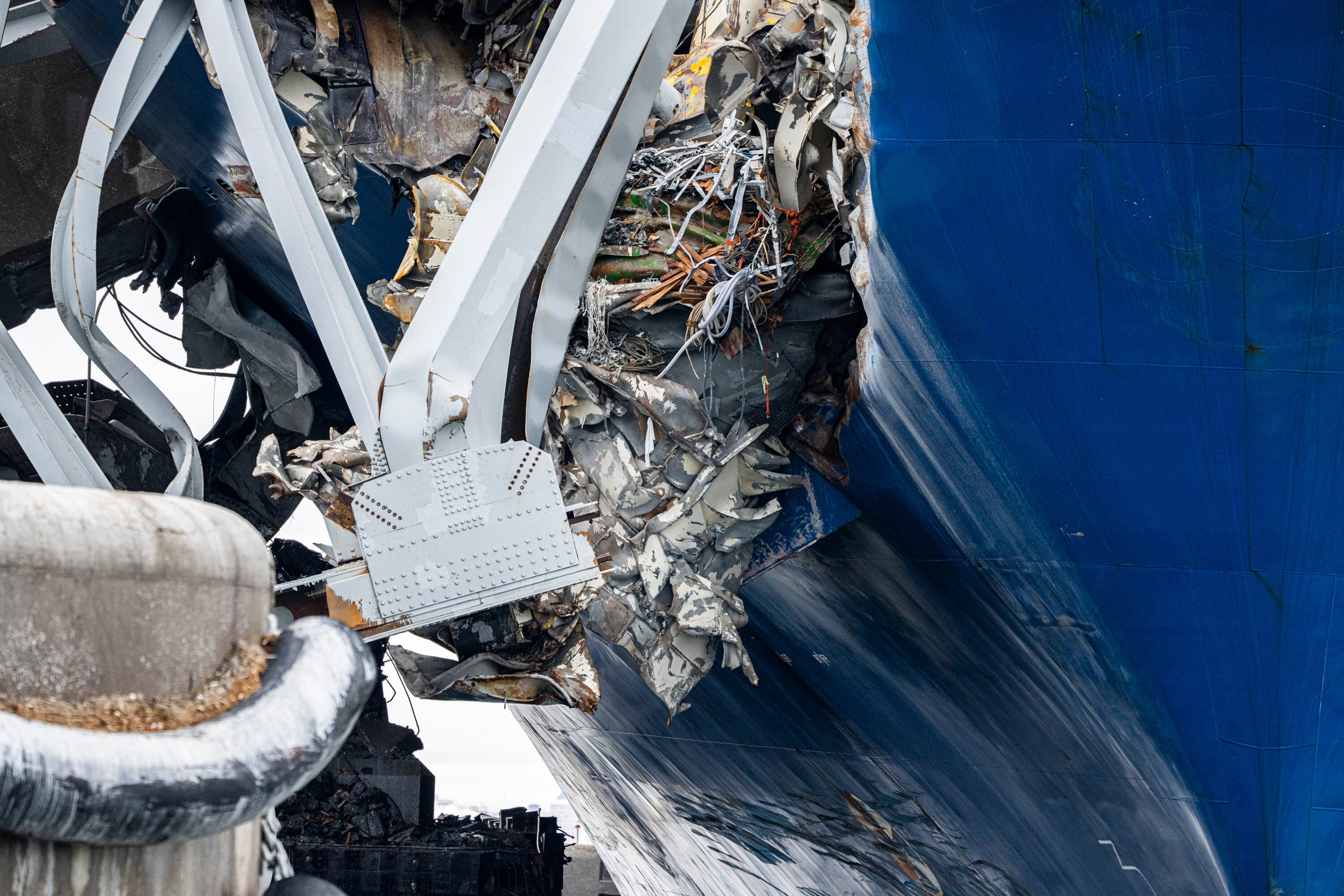 The Dali sustained a lot of damage from the bridge, as evident in this large hole in its side.