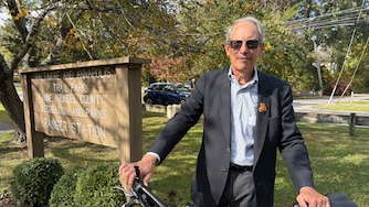 Jon Korin, president of Bicycle Advocates for Annapolis & Anne Arundel County, stands with his bike near the Baltimore & Annapolis Trail in Severna Park on Thursday, Oct. 29 2026.