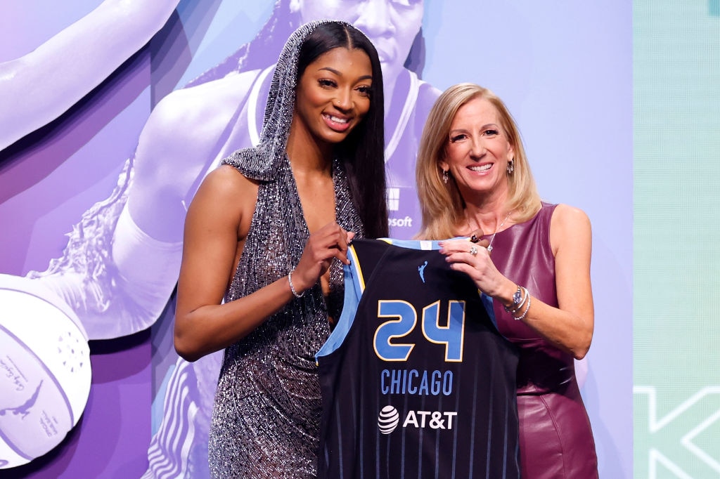 Angel Reese poses with WNBA Commissioner Cathy Engelbert after being selected seventh overall pick by the Chicago Sky during the 2024 WNBA Draft at Brooklyn Academy of Music on April 15, 2024 in New York City. (Photo by Sarah Stier/Getty Images)
