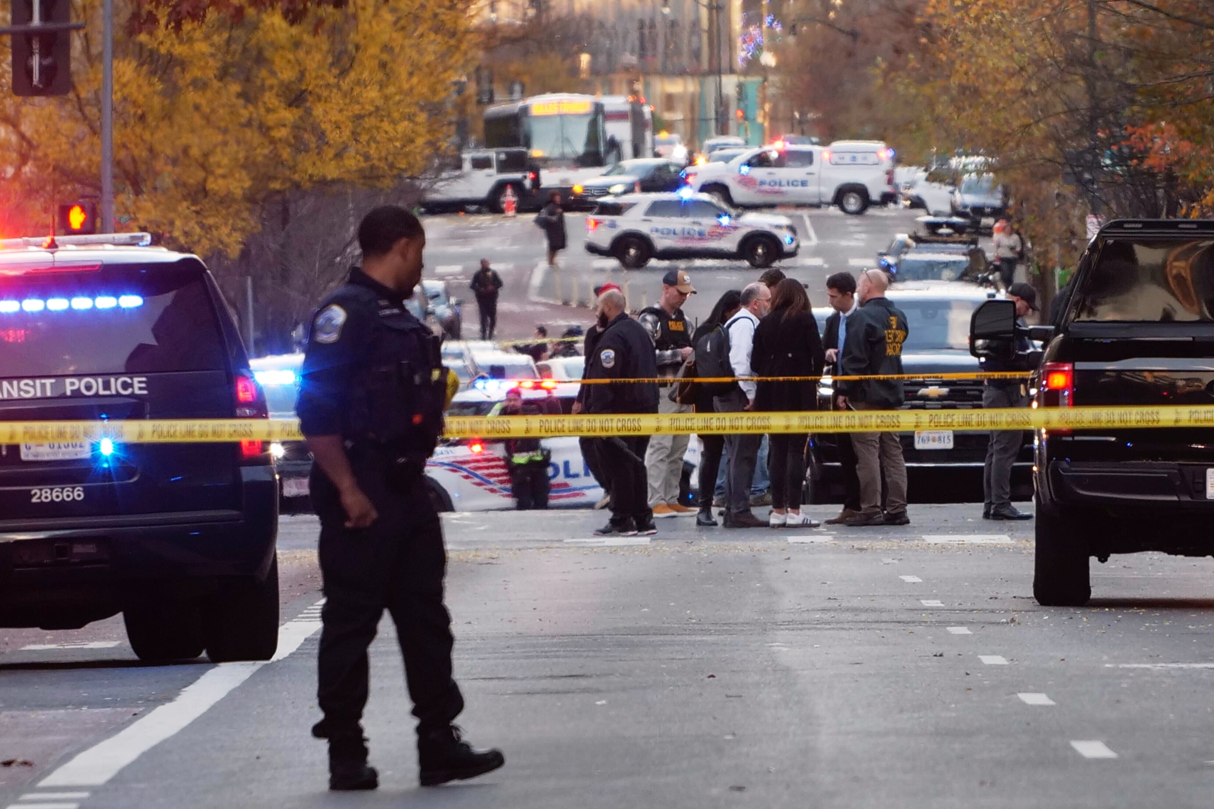 Streets are blocked after reports that two National Guard soldiers were shot near the White House in Washington, Wednesday, Nov. 26, 2025.