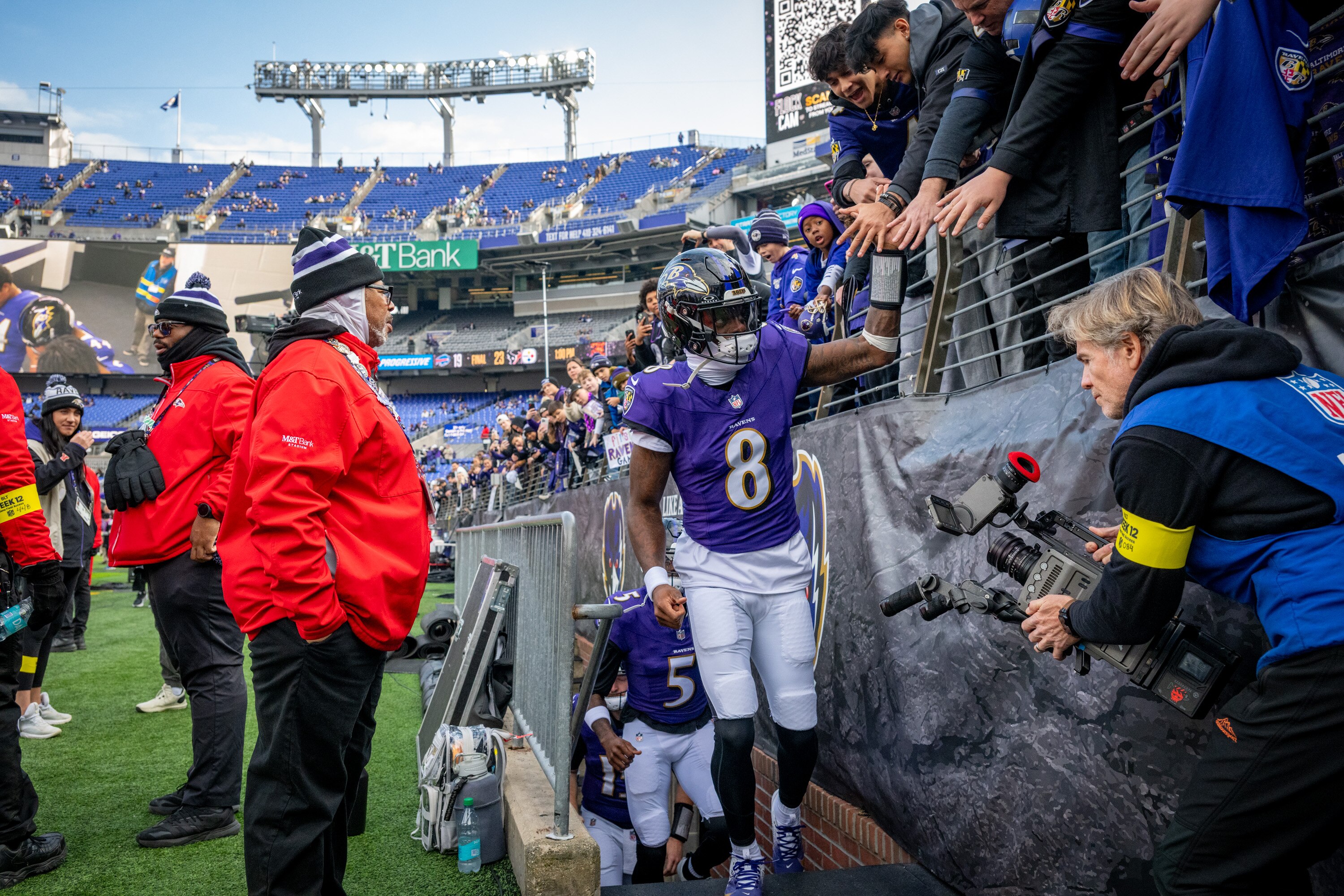 Ravens quarterback Lamar Jackson takes the field for warmups before the team’s Week 12 win over the New York Jets.