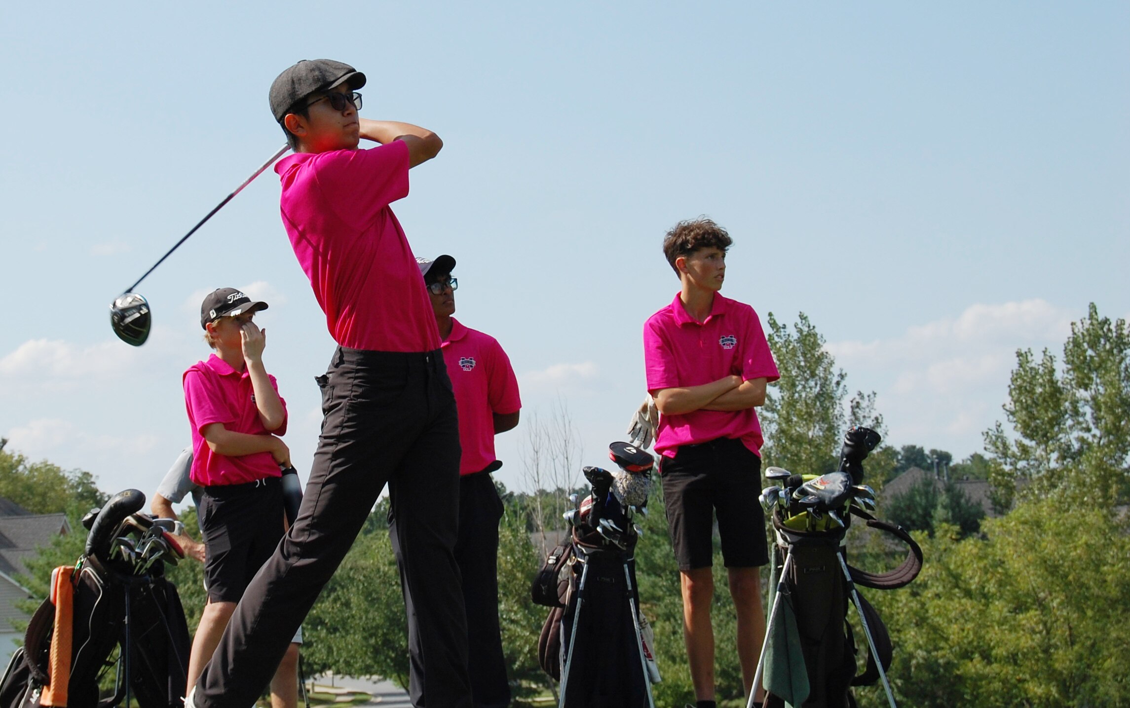 Marriotts Ridge's Sangmin Lee tees off on the fourth hole at Waverly Woods Wednesday, as the Mustangs stretched their Howard County win streak to 84 matches.