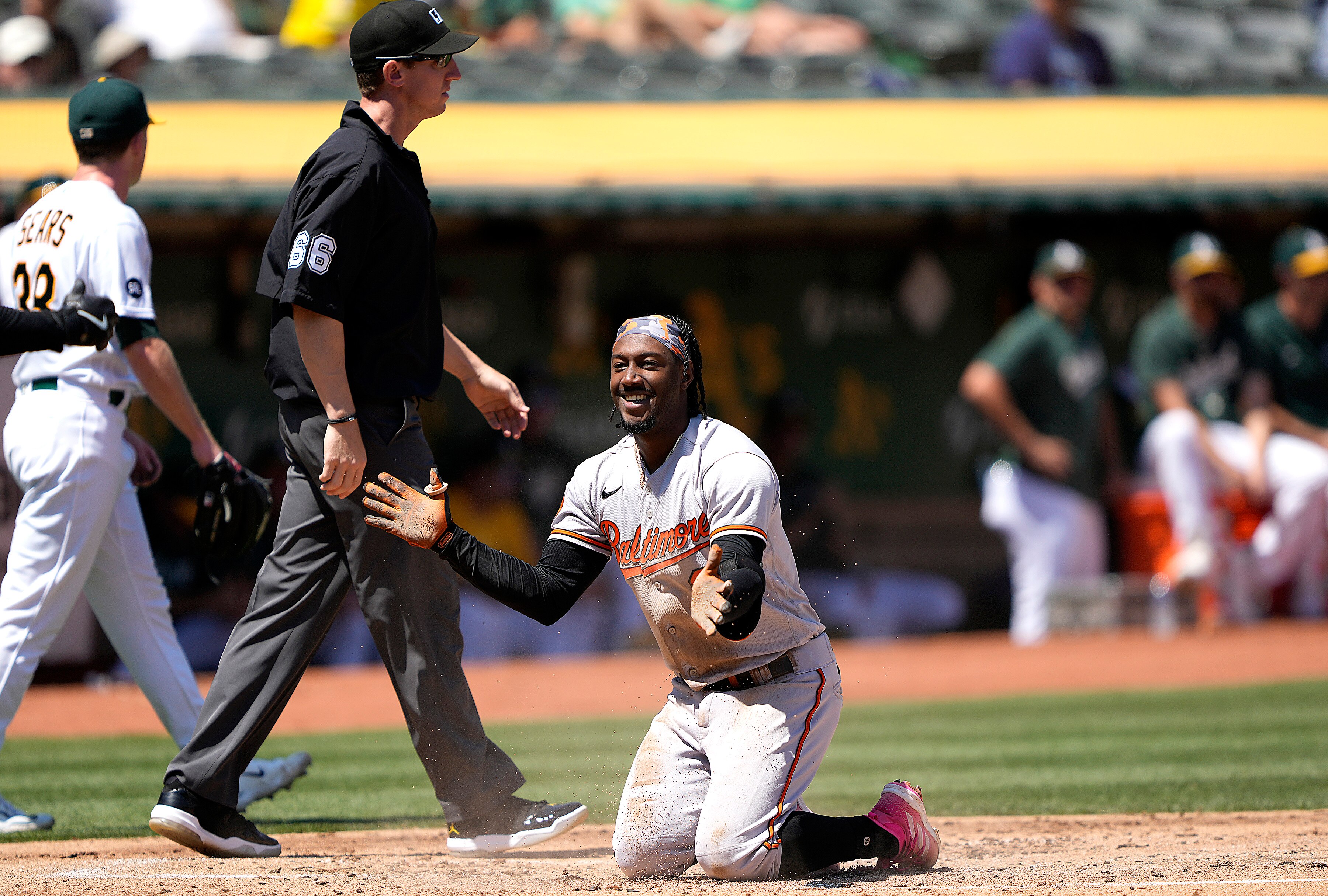 With help from a long bounce off the fence, Jorge Mateo turned what appeared to be a double into an inside-the-park home run Sunday in Oakland.