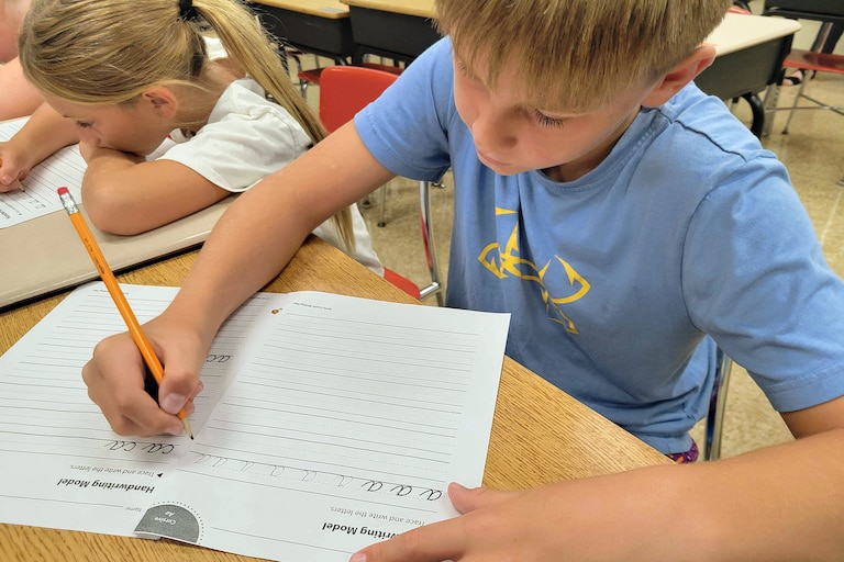AUGUST 28, 2026 - Oliver Goodwin, 9, is practicing writing the lowercase letter "A".