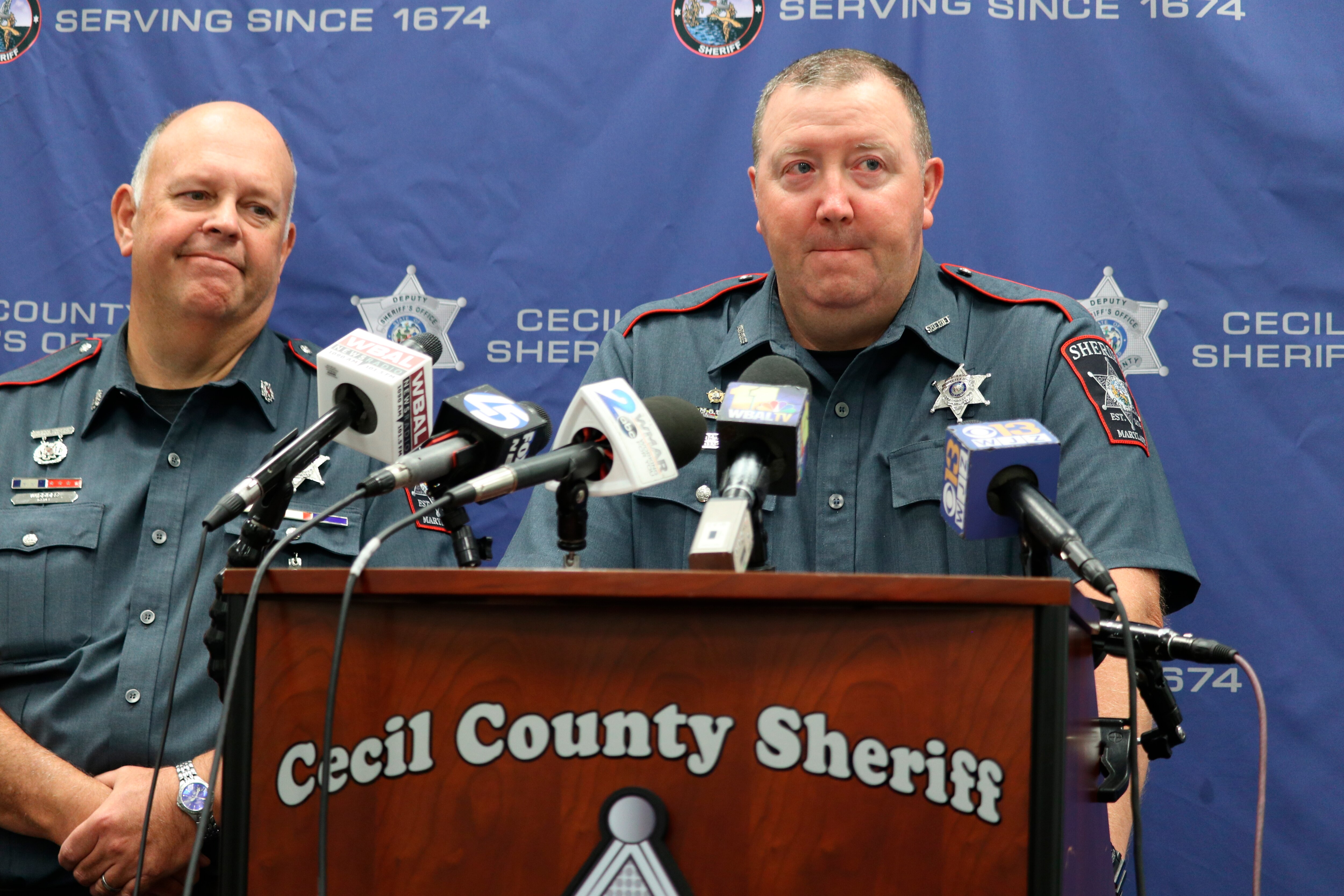 Cecil County Sheriff Scott Adams speaks at a news conference on Friday, Sept. 9, 2022 in Elkton, Md., about five people, including three children, who were found dead with gunshot wounds at a home in Elk Mills, Md., earlier in the day. Chief Deputy Gerald Widdoes is standing left.