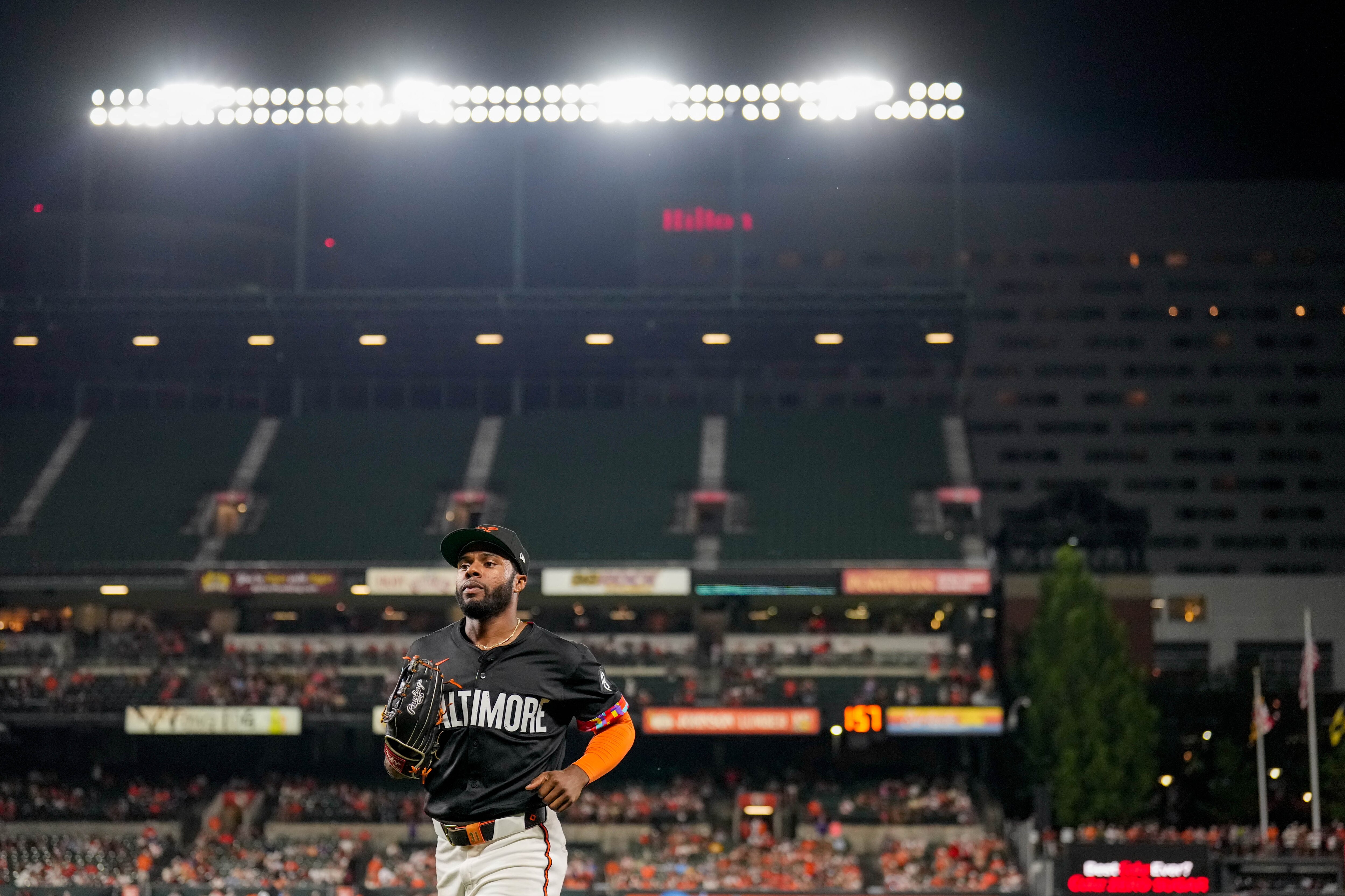 Cedric Mullins jogs back to the dugout in the 9th inning of a game against the Colorado Rockies.