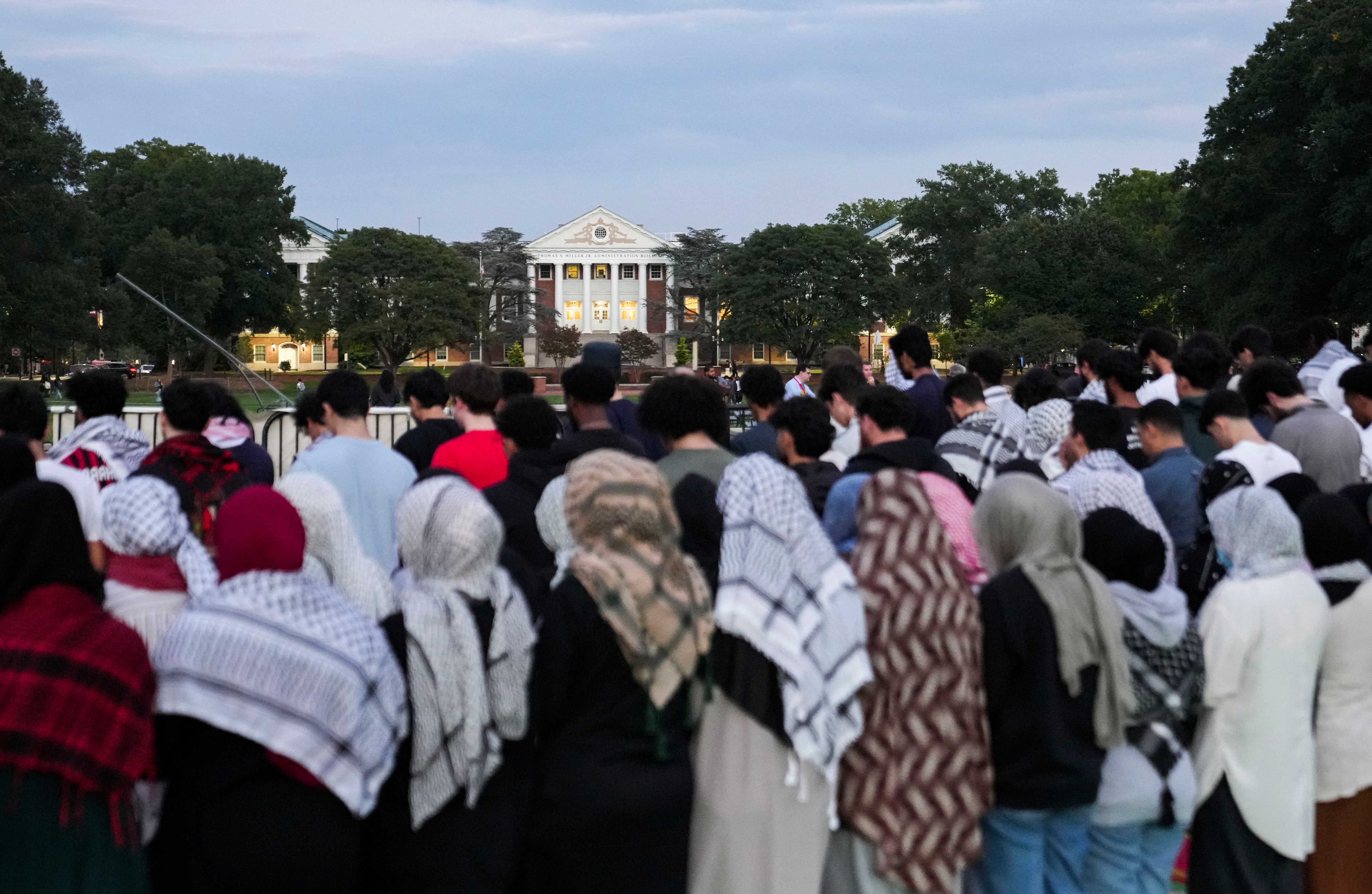 Students gather to pray at McKeldin Mall on the University of Maryland campus for an interfaith vigil in 2024.