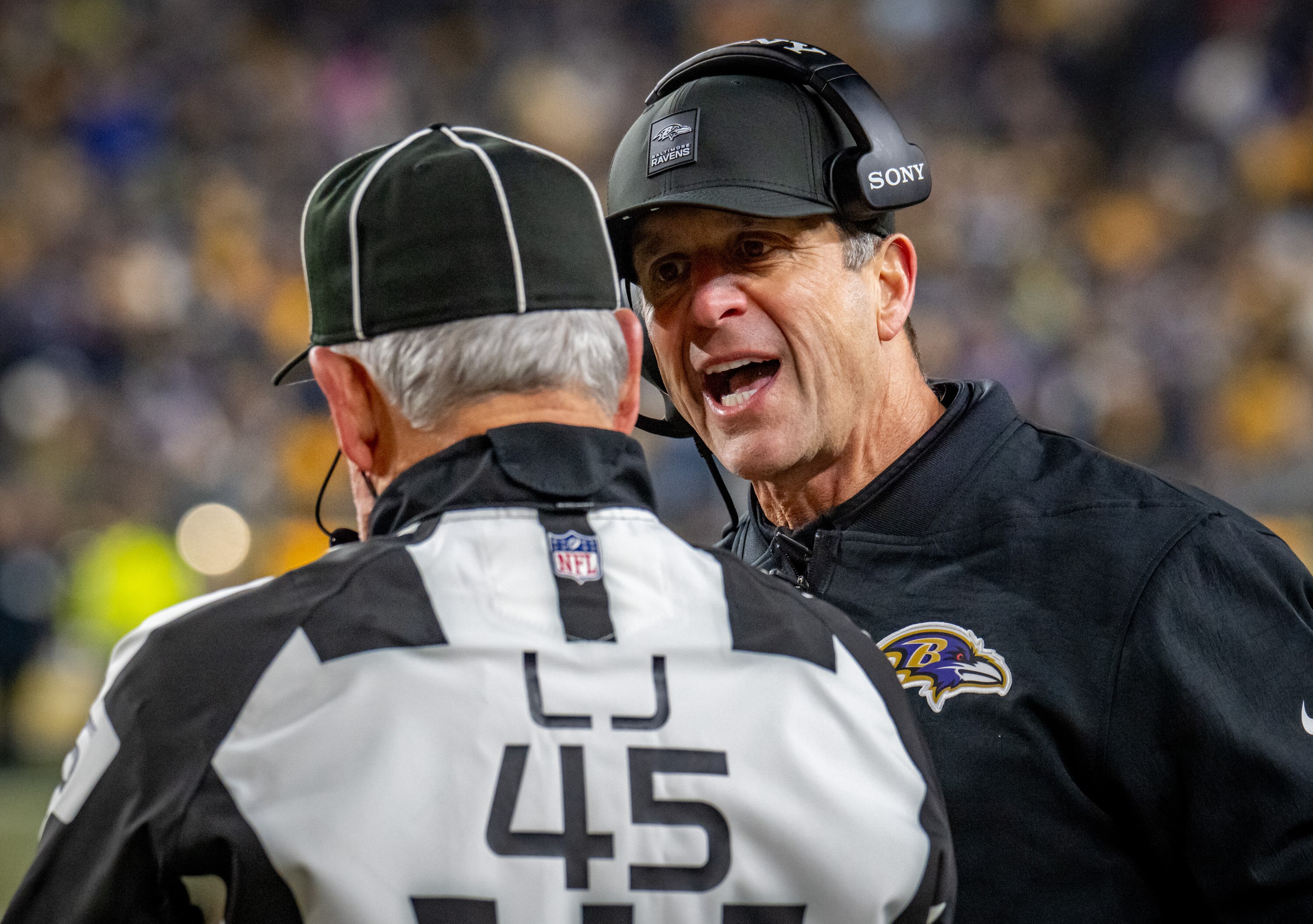 Baltimore Ravens head coach John Harbaugh expresses frustration with a referee in the fourth quarter. The Steelers defeated the Ravens 26-24 at Acrisure Stadium in Pittsburgh. 