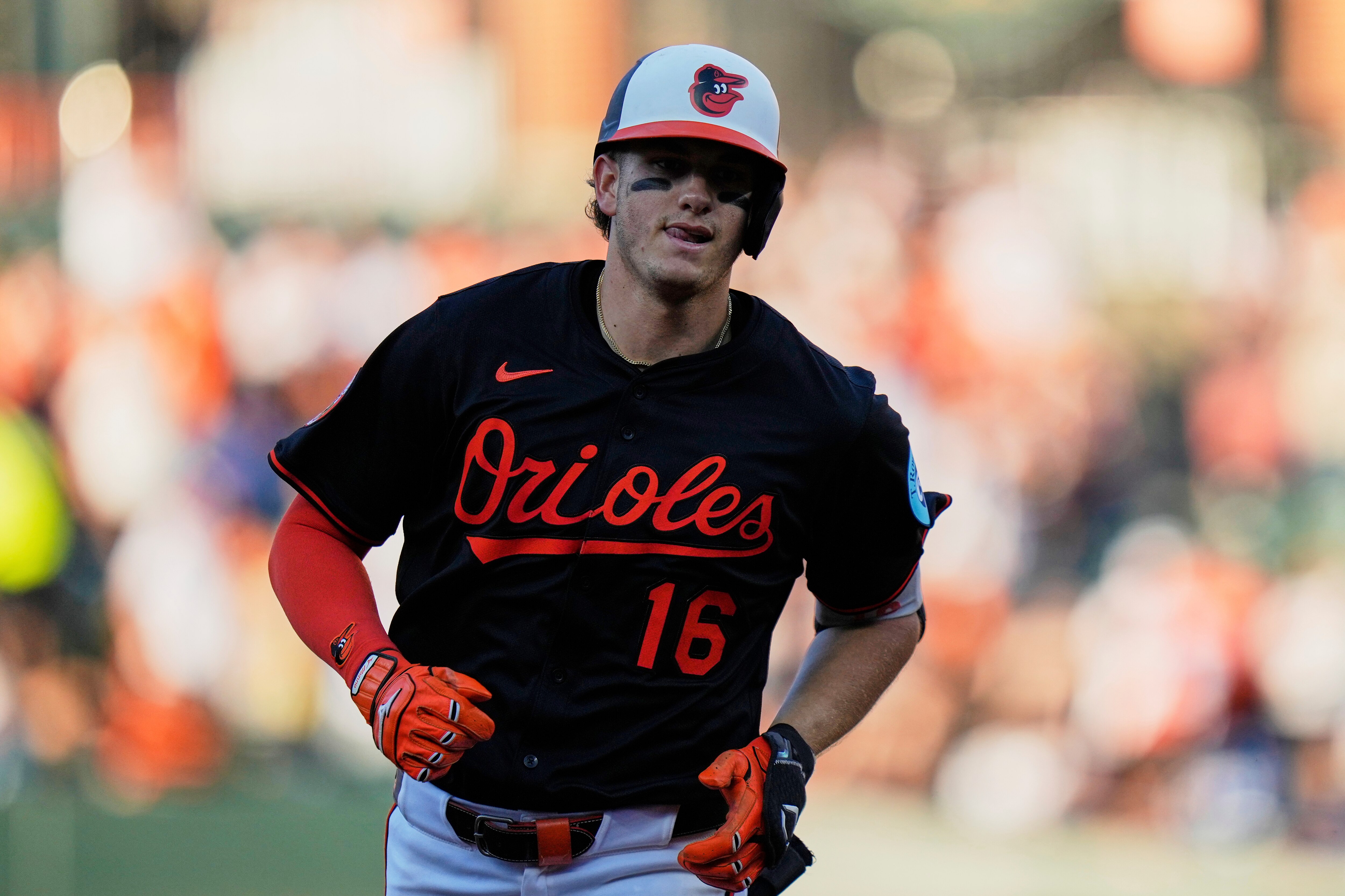 Baltimore Orioles' Coby Mayo rounds the bases after hitting a home run during the second inning of a baseball game against the Toronto Blue Jays.