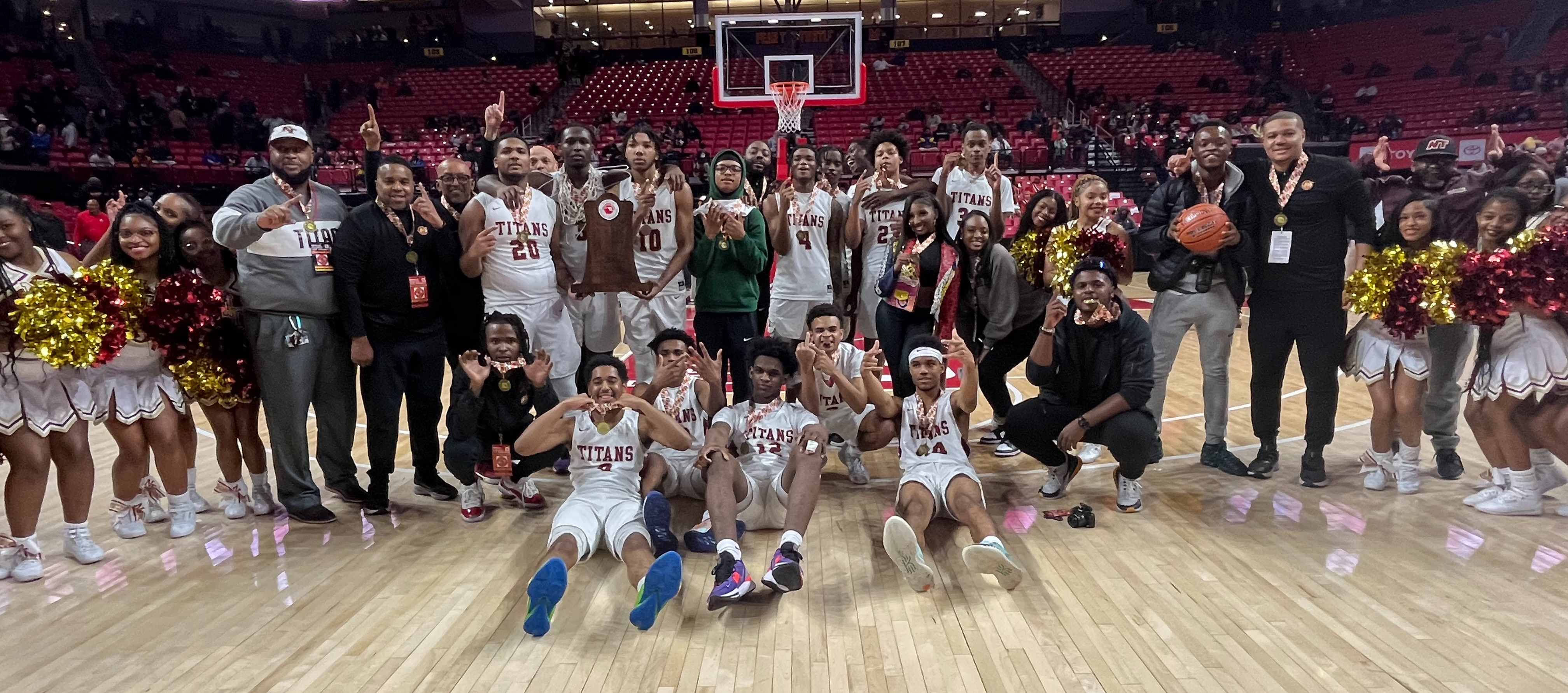 New Town boys basketball team showed it poise in the final minutes of Thursday's Class 2A state championship game. The No. 4 Titans scored the final 7 points to defeat Prince George's County's Largo, 64-57. at the University of Maryland's Xfinity Center.