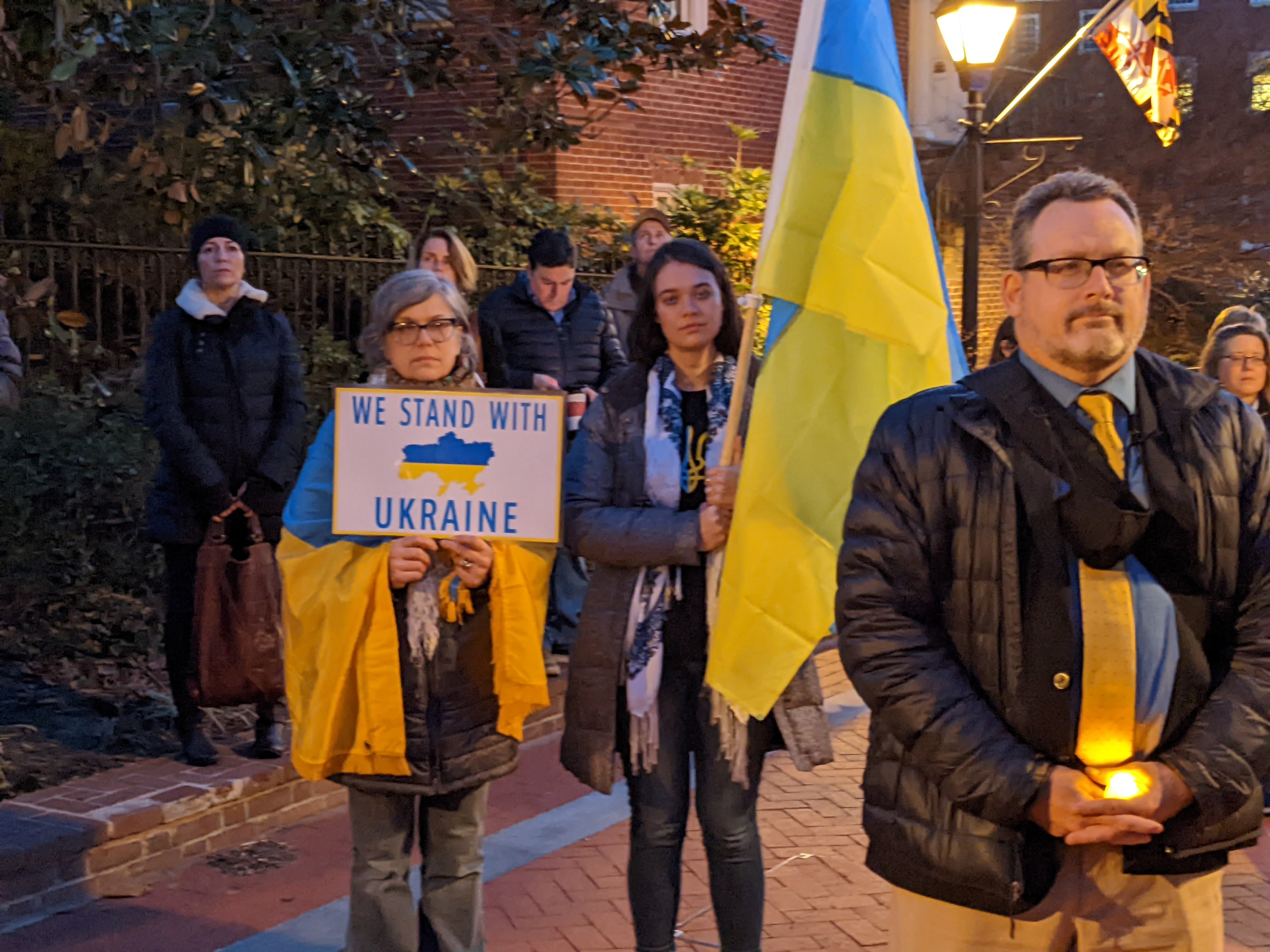 Supporters of Ukraine stand vigil at a State House rally in Annapolis on March 2, 2022.