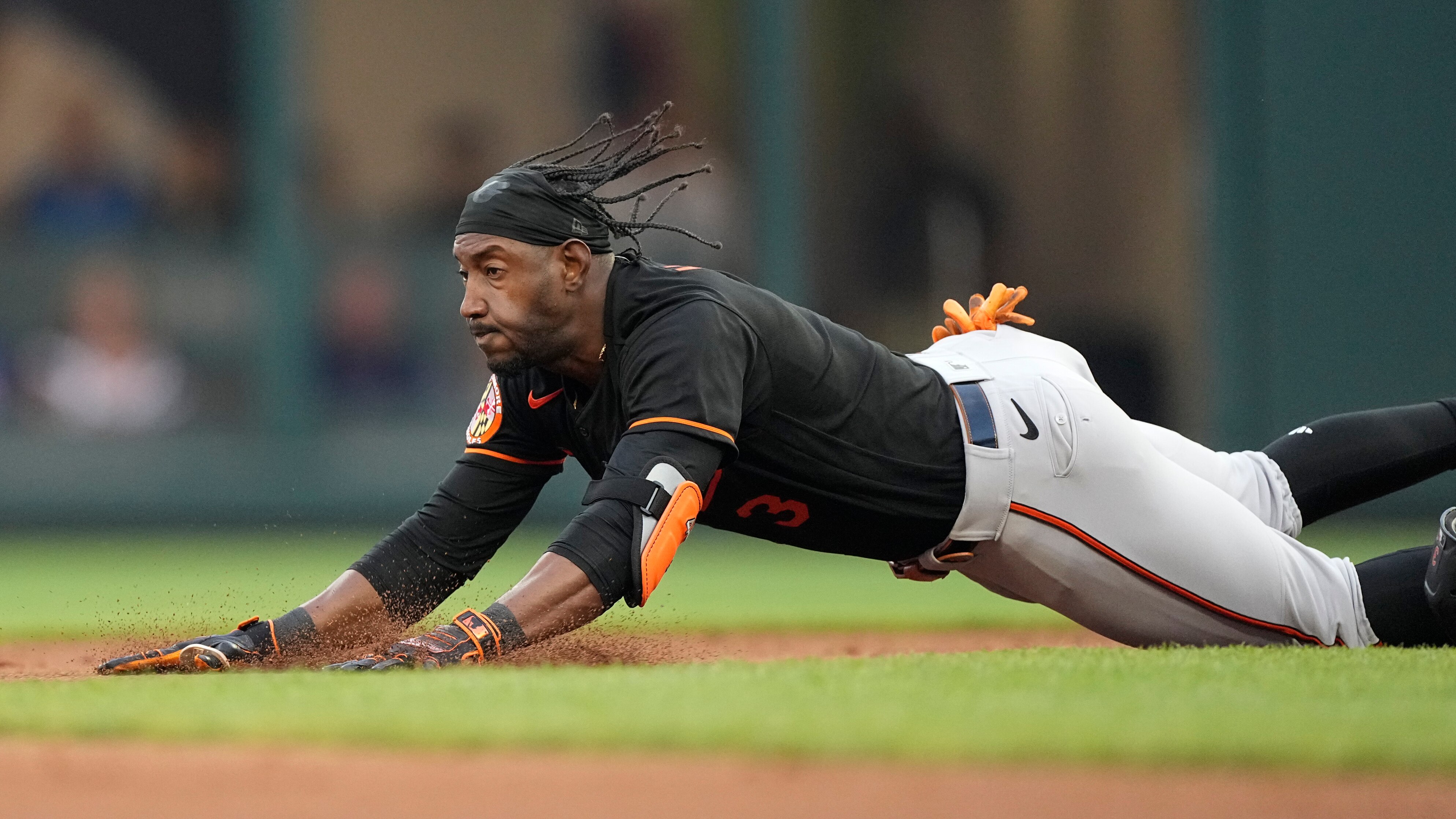 Baltimore Orioles' Jorge Mateo slides into second base with a double in the third inning of a baseball game against the Atlanta Braves, Saturday, May 6, 2023, in Atlanta.