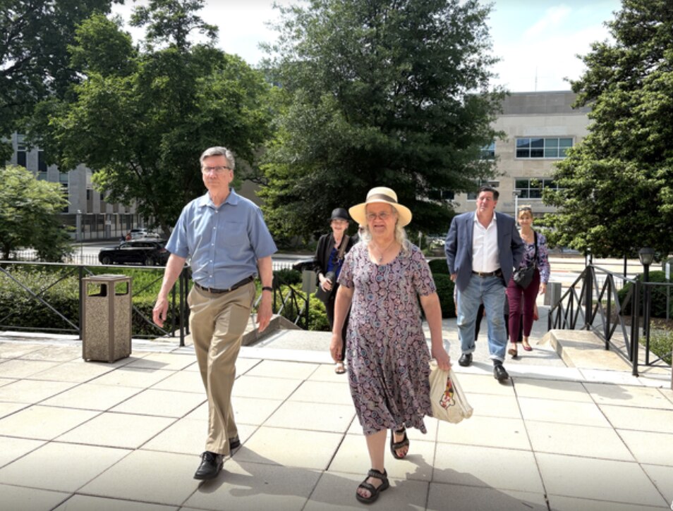 A group of Baltimore County residents visit the county courthouse on Friday. May 16, 2025 to deliver a petition calling for the reappointment of Inspector General Kelly Madigan. She was recently advised by the new county executive that she would not be reappointed.