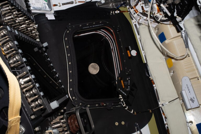 Before going to sleep on flight day 5, the Artemis II crew snapped one more photo of the Moon, as it drew close in the window of the Orion spacecraft.