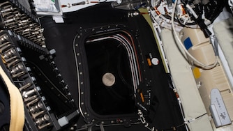 Before going to sleep on flight day 5, the Artemis II crew snapped one more photo of the Moon, as it drew close in the window of the Orion spacecraft.