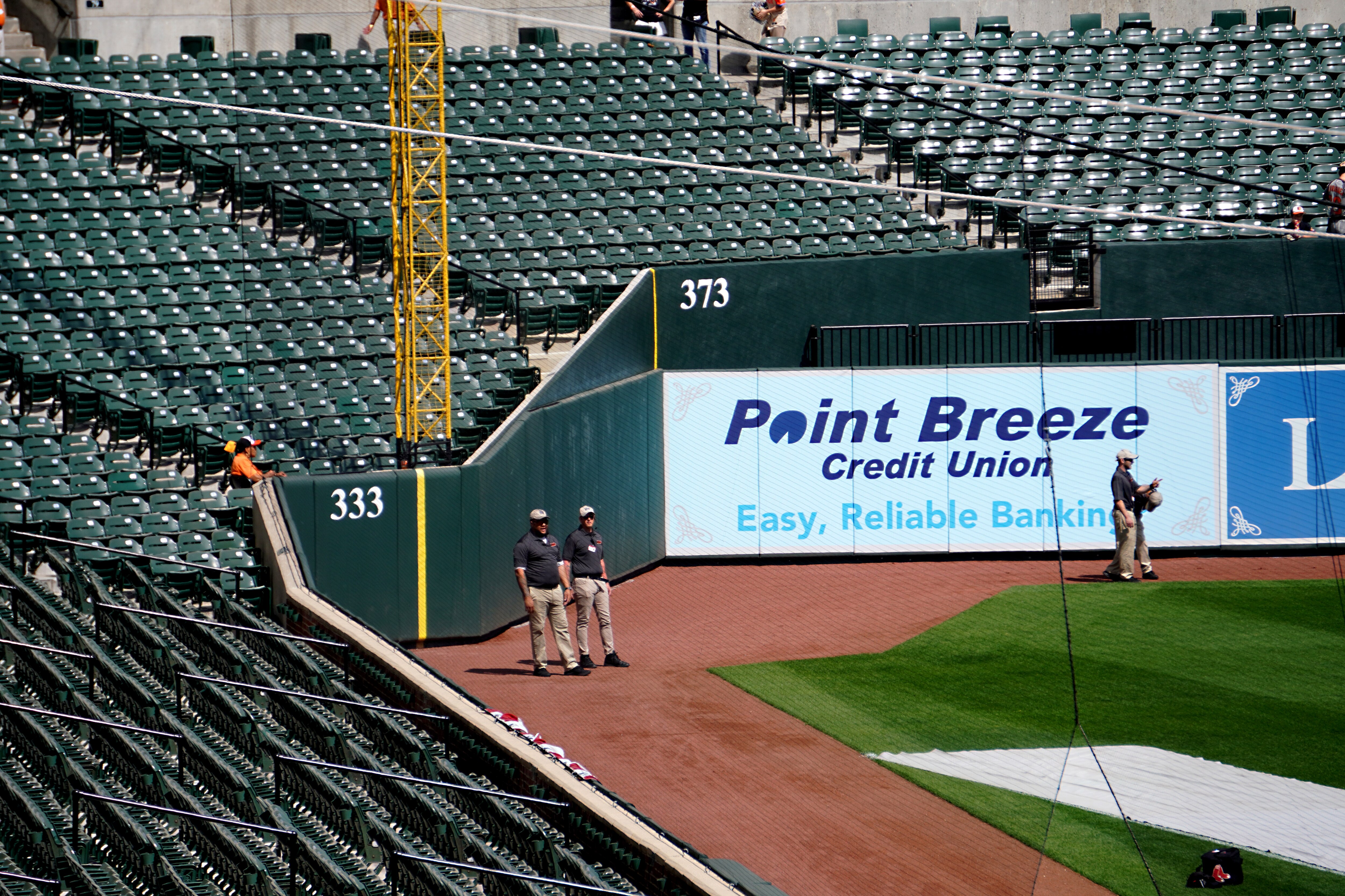 The new left field wall on Monday, March 31, 2025, where you can see the thin yellow line that helps differentiate a ball that is in play and a ball that is out of play.