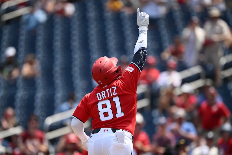 Washington Nationals' Abimelec Ortiz celebrates his solo home run during the third inning of a baseball game against the Cincinnati Reds, Sunday, Aug. 9, 2026, in Washington. (AP Photo/Nick Wass)
