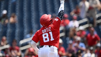 Washington Nationals' Abimelec Ortiz celebrates his solo home run during the third inning of a baseball game against the Cincinnati Reds, Sunday, Aug. 9, 2026, in Washington. (AP Photo/Nick Wass)
