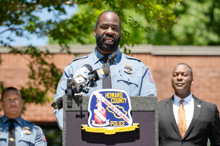 Major Terrence Benn, center, has been appointed to acting police chief by Howard County Executive Calvin Ball.