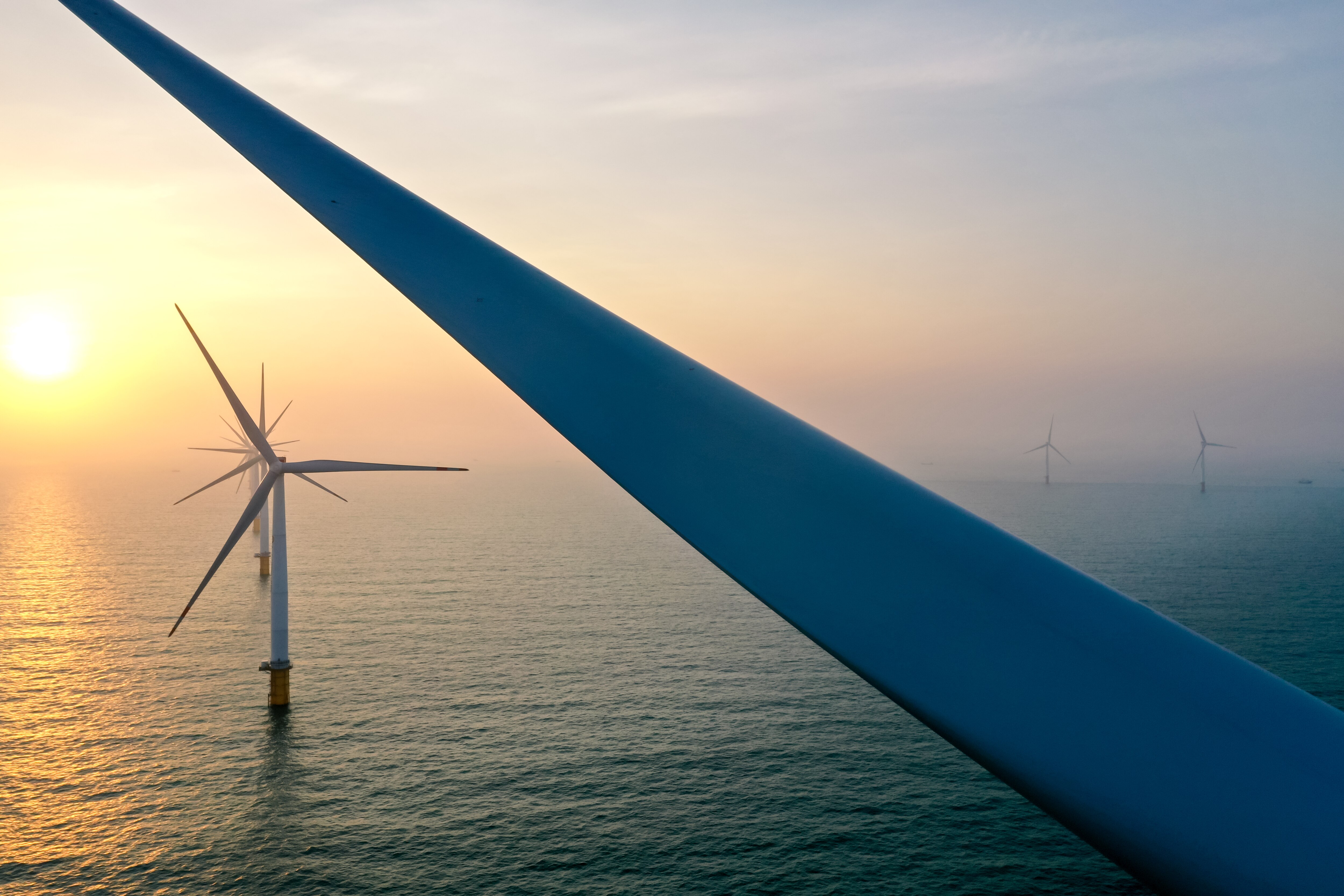 Wind turbines in the ocean.
