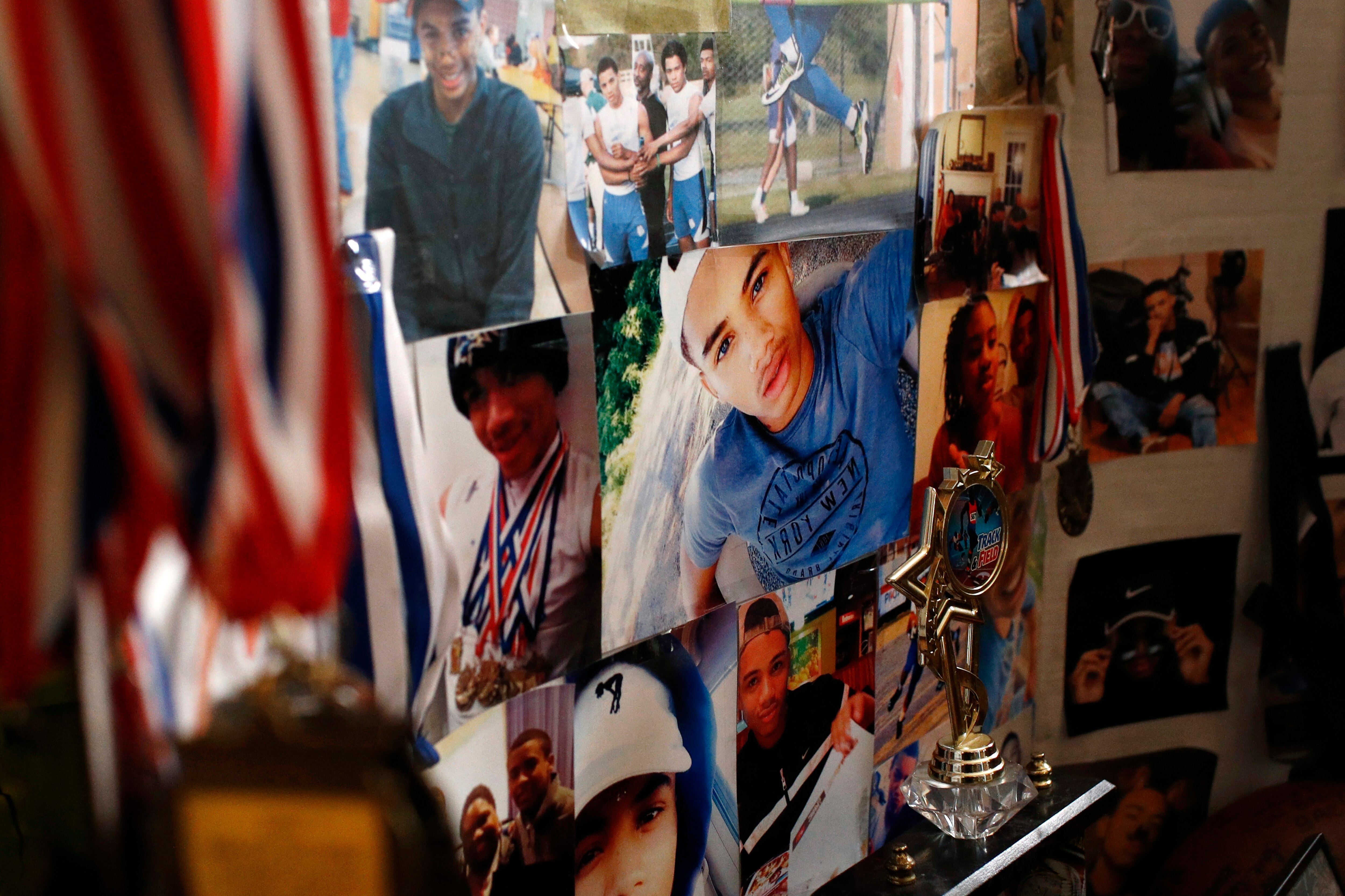 In this Jan. 28, 2019, photo, pictures of Anton Black decorate a collage in his family's home in Greensboro, Md. Black, 19, died after a struggle with three officers and a civilian outside the home in September 2018.