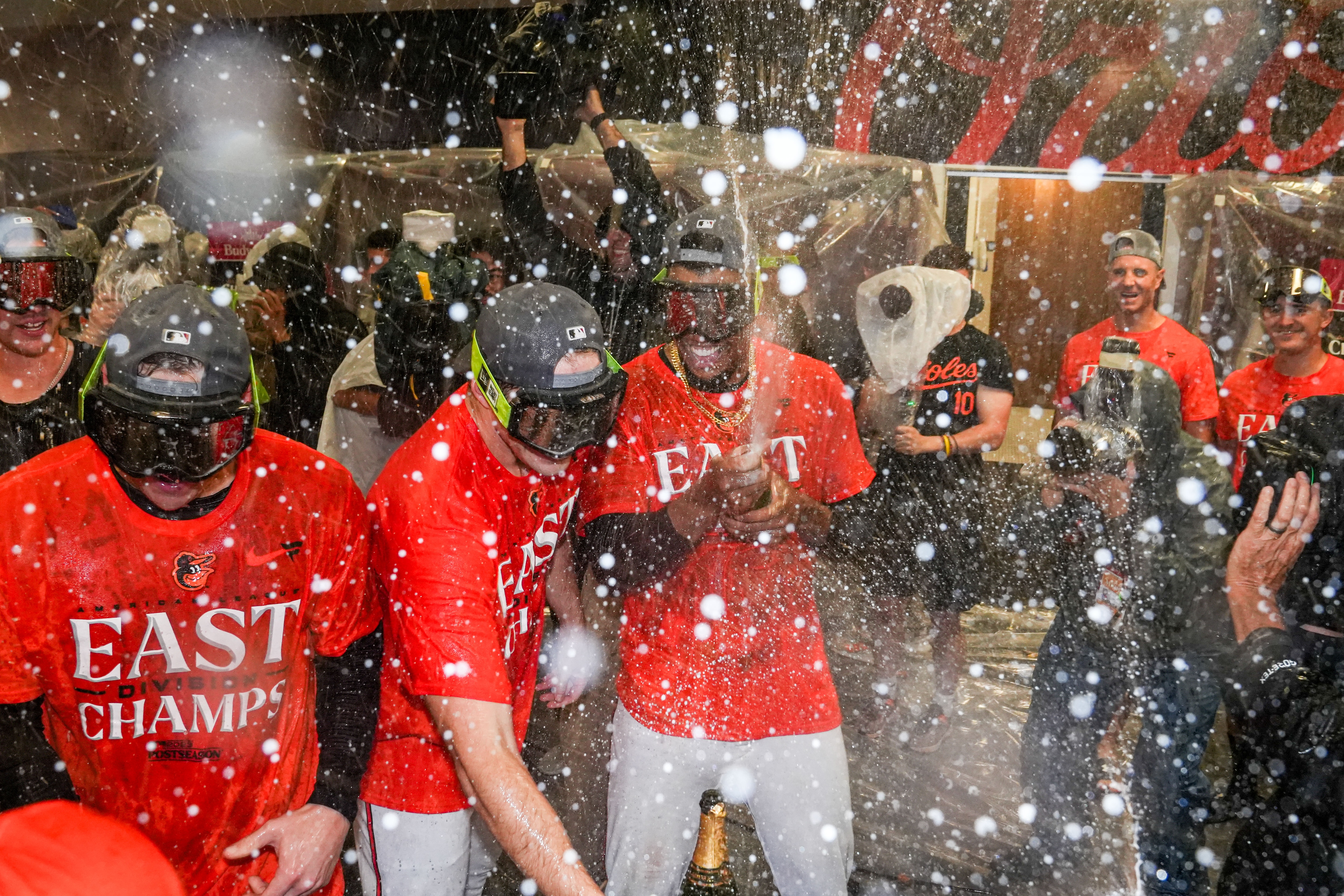 The Baltimore Orioles celebrate in their locker room after clinching the AL East division on Thursday, September 28, 2023. The beat the Boston Red Sox, 2-0, to secure control of the division.