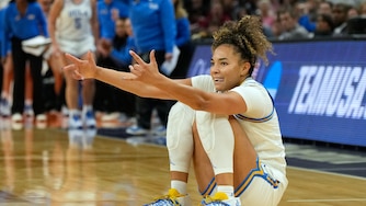 UCLA guard Kiki Rice celebrates after making a 3-point shot against South Carolina during the first half of the women's National Championship