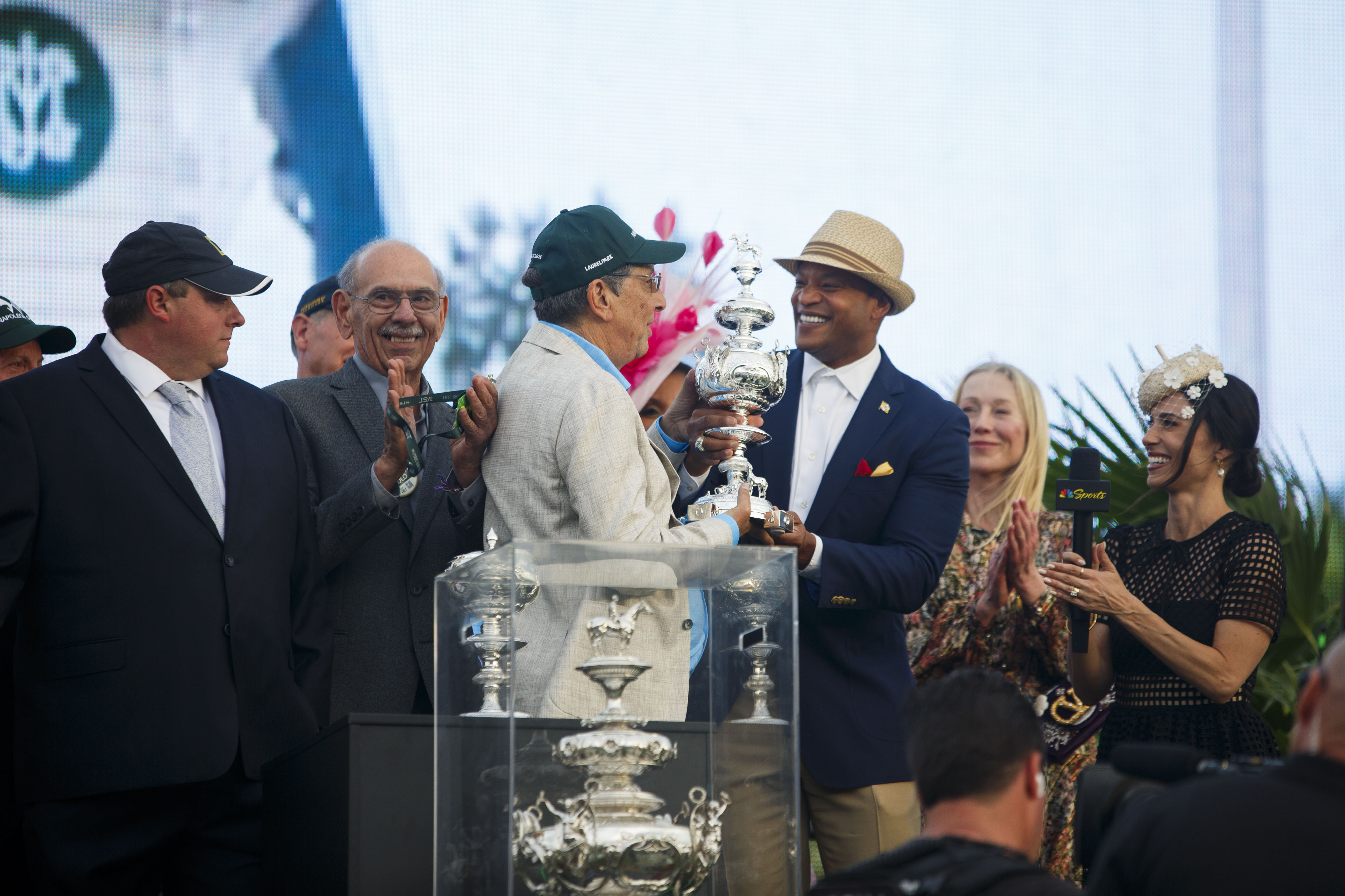 Governor Wes Moore hands The Woodlawn Vase to owner Al Gold in the winners circle at  the 151st Running of The Preakness Stakes at Laurel Park Racetrack on Saturday, May 16, 2026.