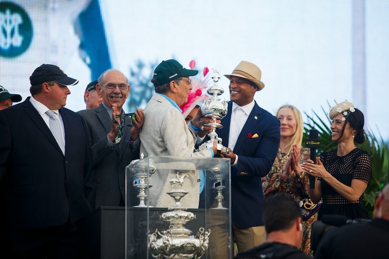 Governor Wes Moore hands The Woodlawn Vase to owner Al Gold in the winners circle at the 151st Running of The Preakness Stakes at Laurel Park Racetrack on Saturday, May 16, 2026.