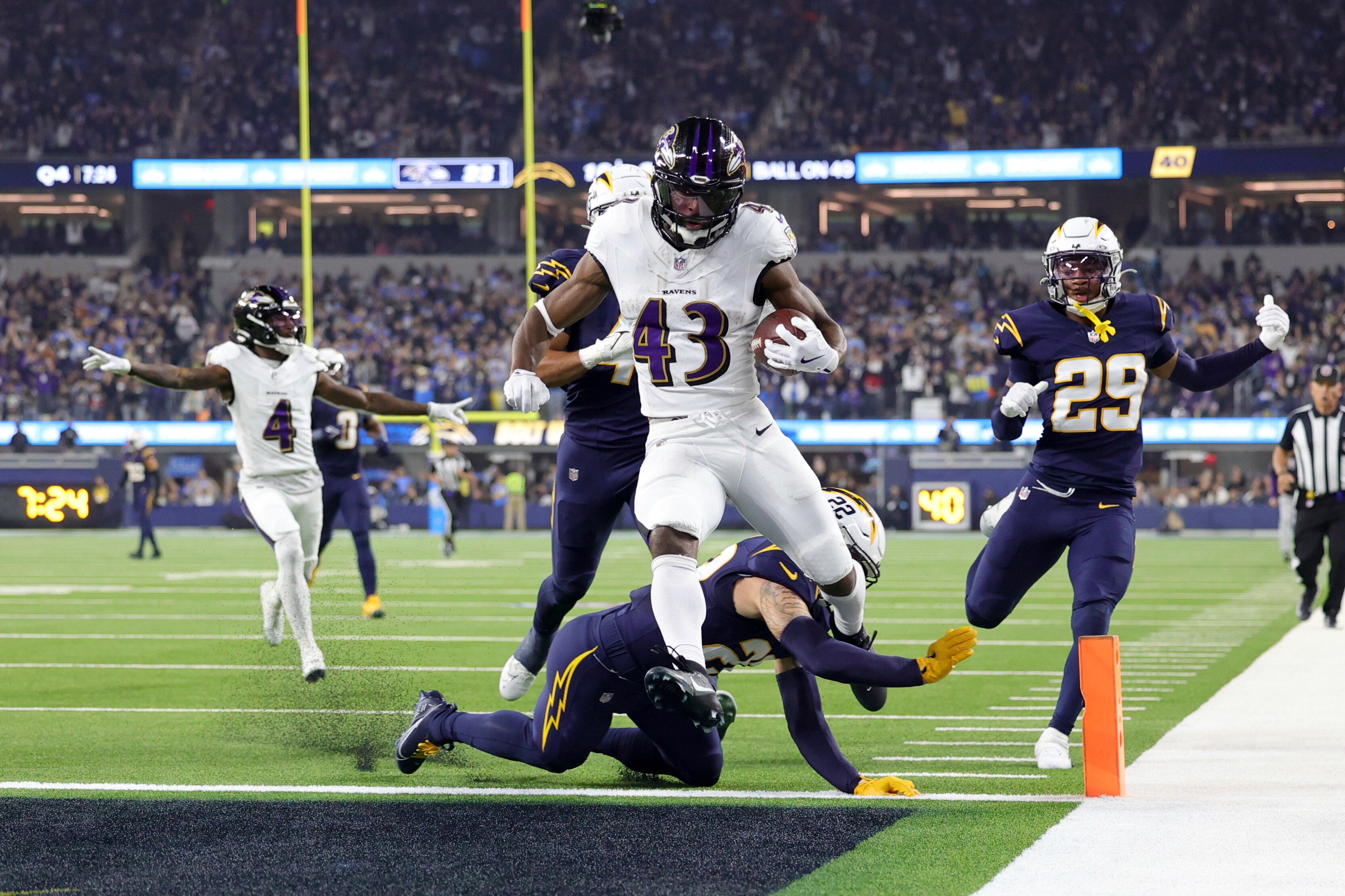 Ravens running back Justice Hill scores on the longest run of his career, 51 yards, to secure the win.