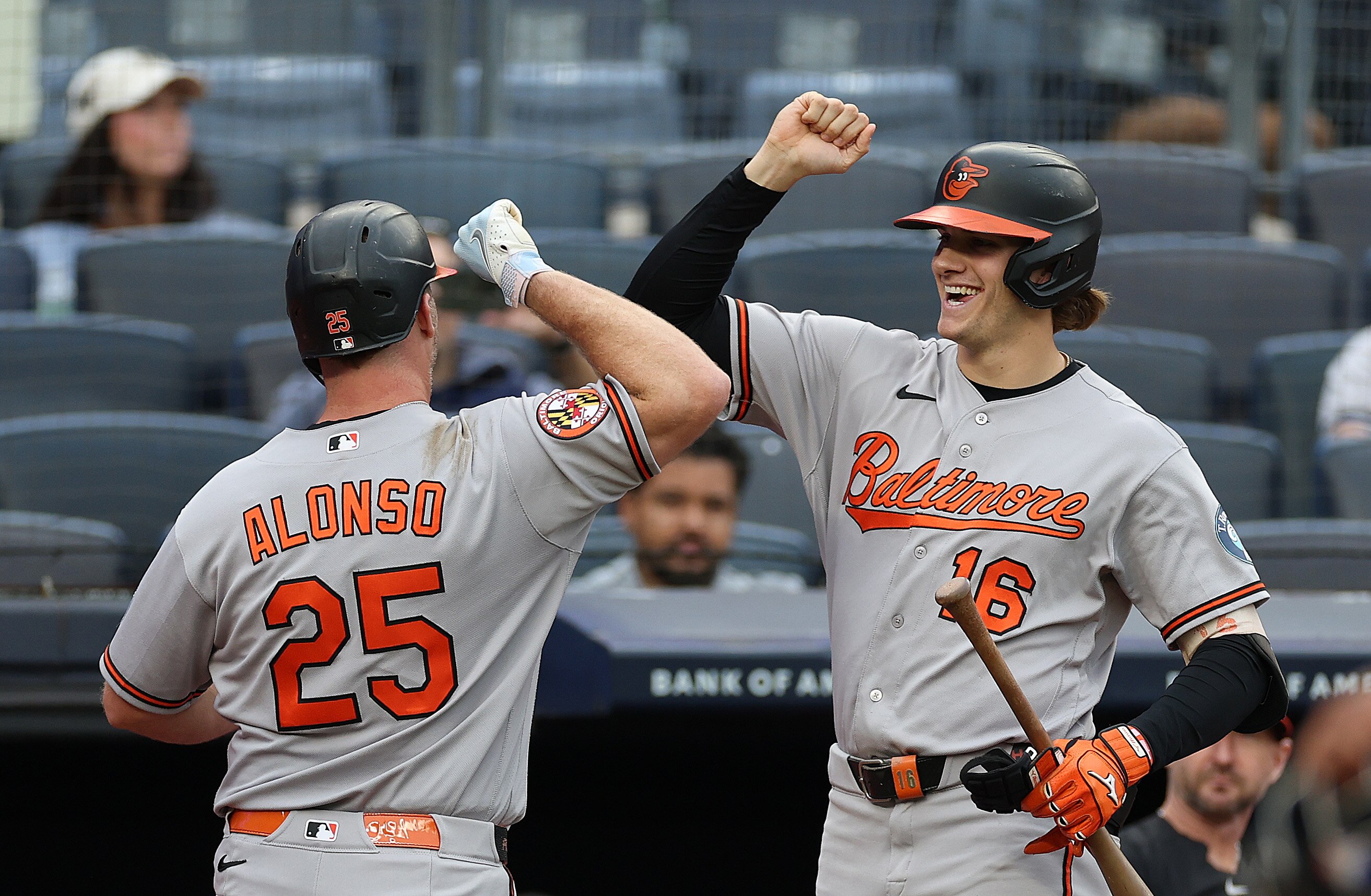 Coby Mayo greets Pete Alonso after the first of Alonso’s two home runs Friday during the first game of a doubleheader in New York.