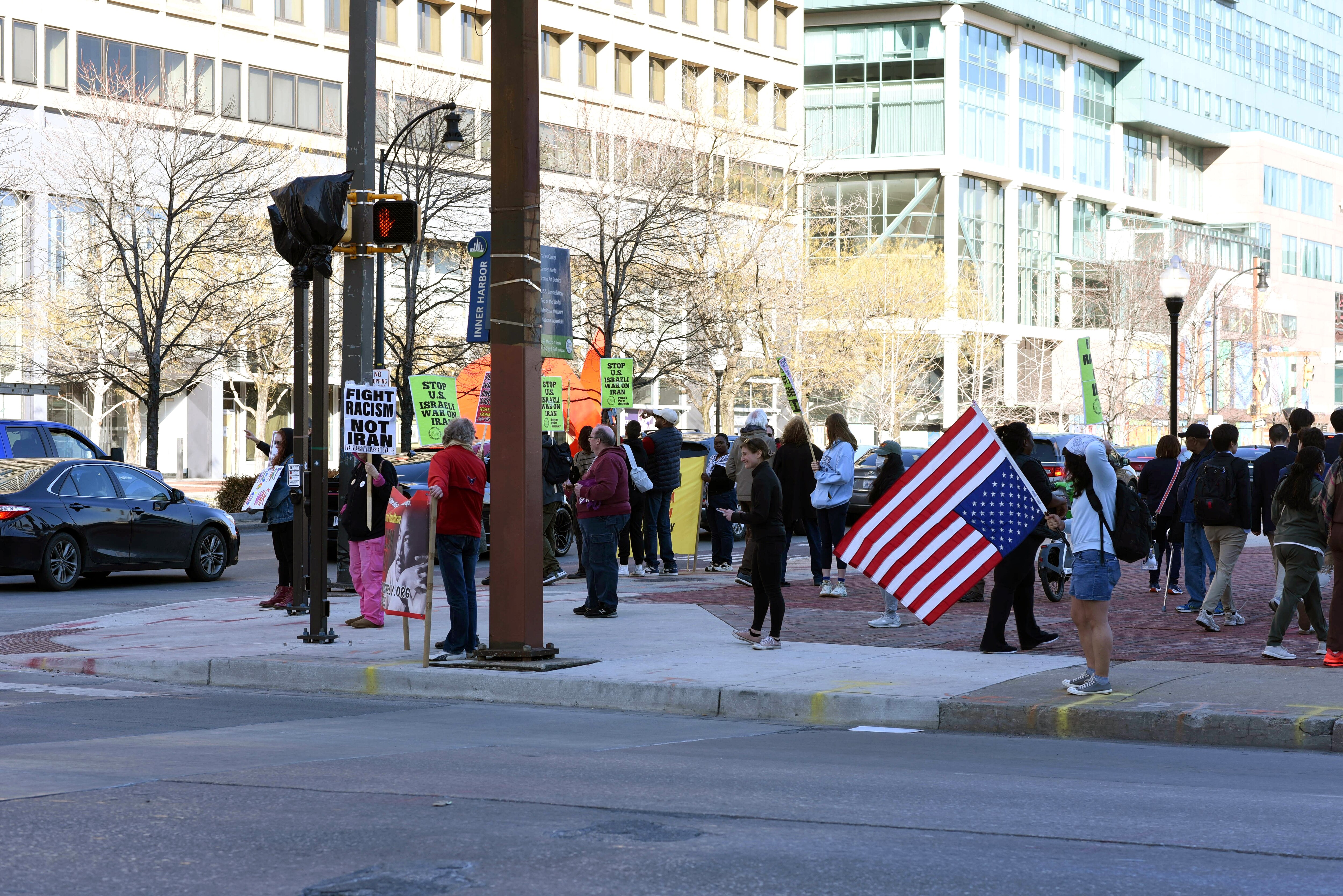 FEBRUARY 28, 2026 -  Crowds of people during the at the protest in McKeldin Plaza against the strikes on Iran.