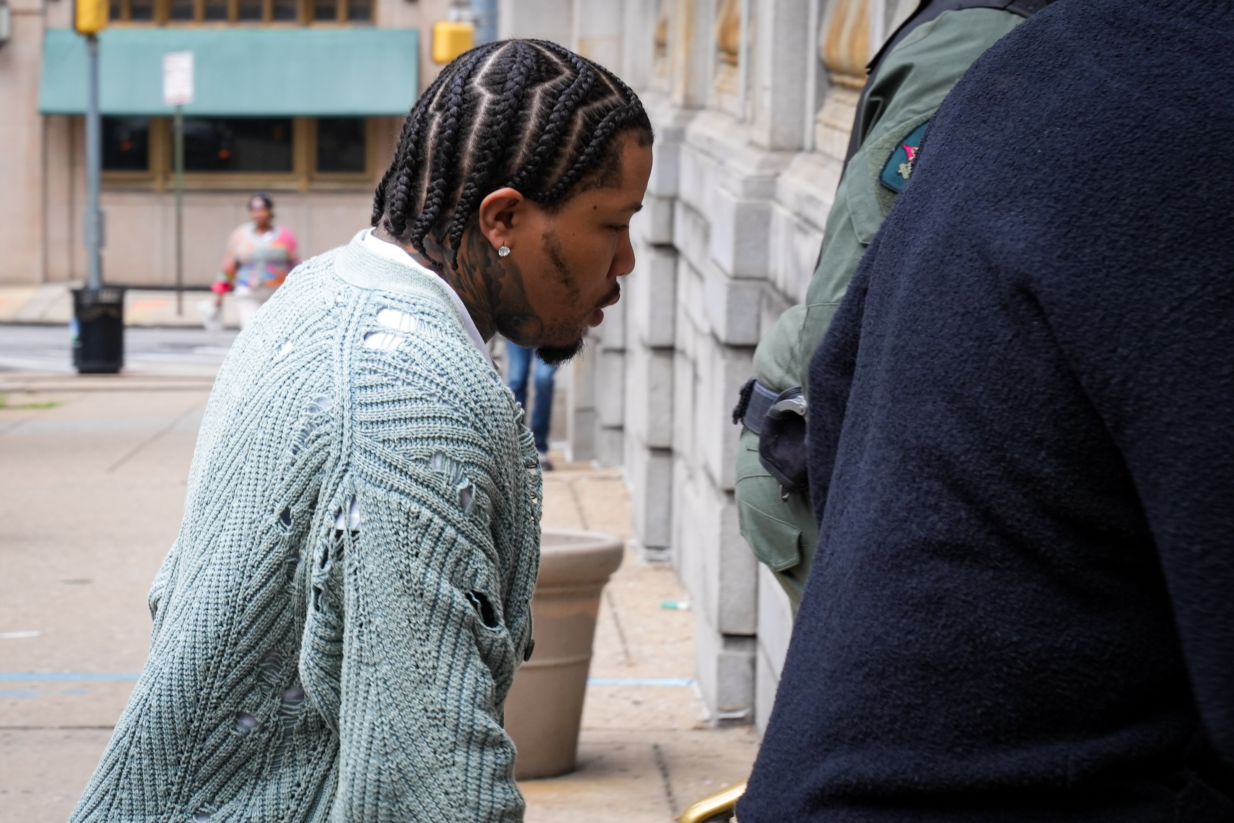 Baltimore boxing champion Gervonta “Tank” Davis arrives for his sentencing at the Elijah E. Cummings Courthouse on Friday, May 5. Davis pleaded guilty to four traffic offenses in connection to a hit-and-run in 2020 that injured four people.