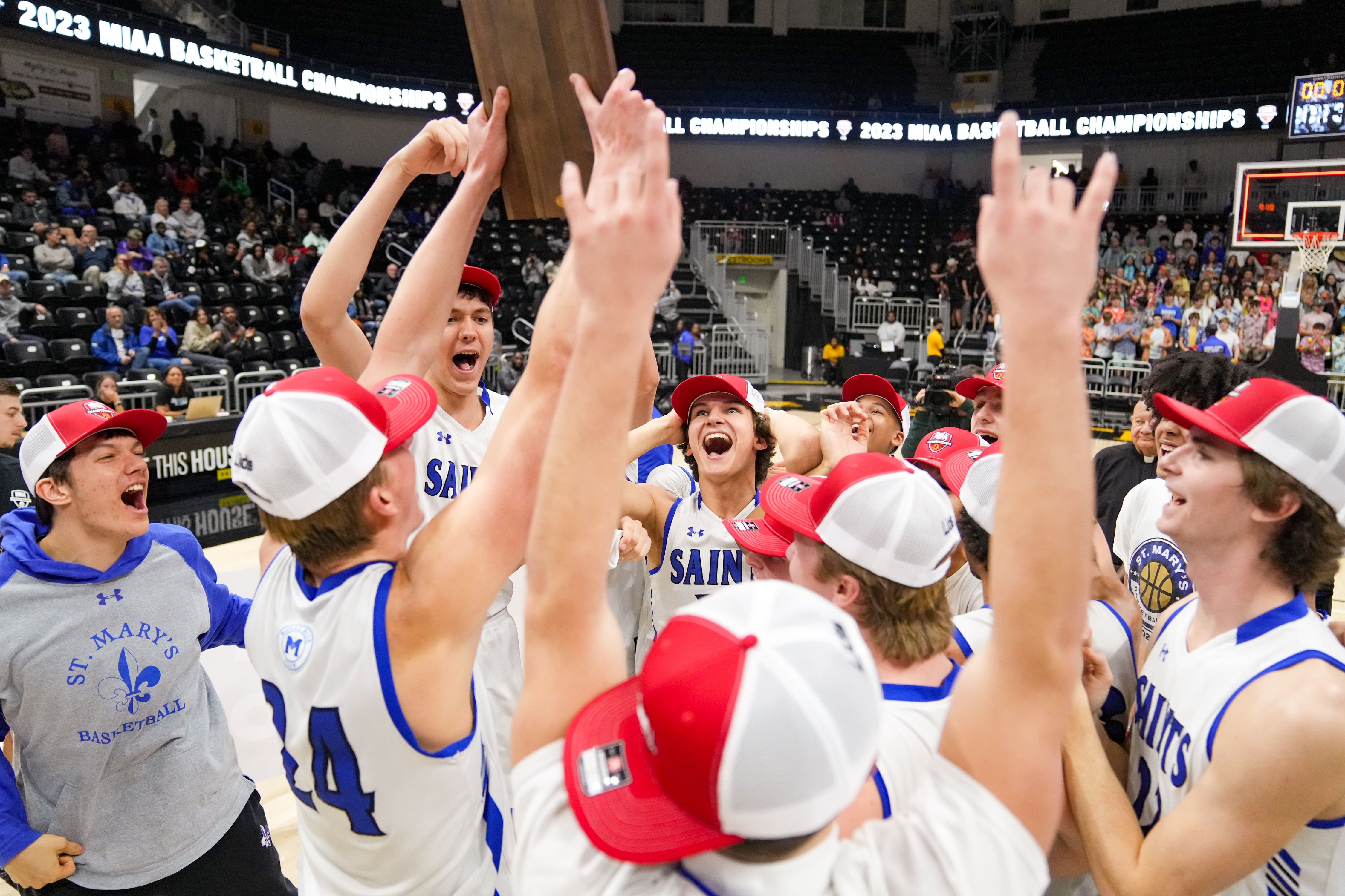 St. Mary's celebrate winning the championship game of the  Maryland Interscholastic Athletic Association B Conference in UMBC's Chesapeake Arena on February 26, 2023.