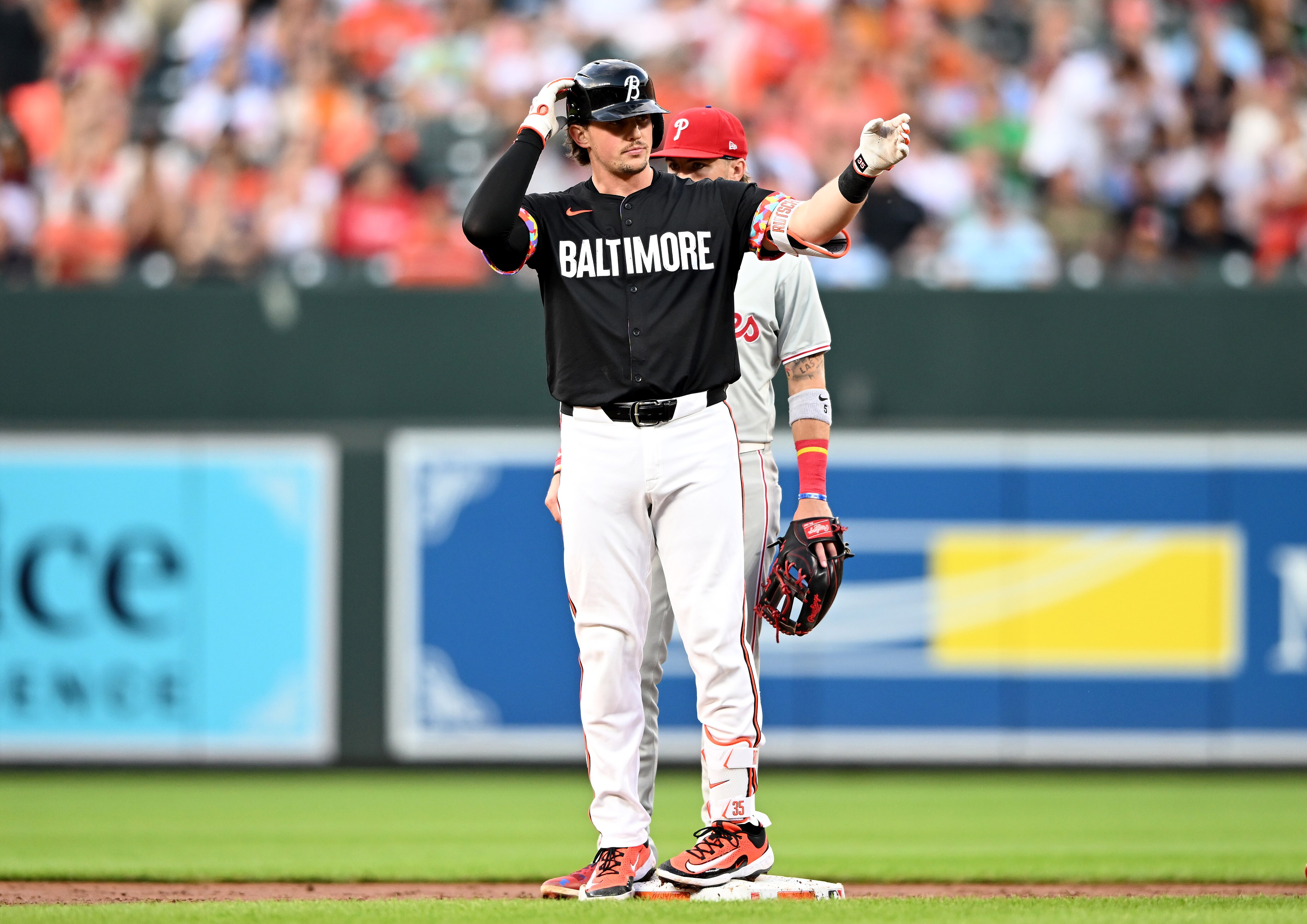 Adley Rutschman celebrates an RBI double in the second inning Friday night at Camden Yards.