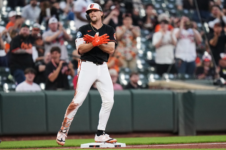 Baltimore Orioles' Gunnar Henderson celebrates after hitting an RBI triple during the third inning.